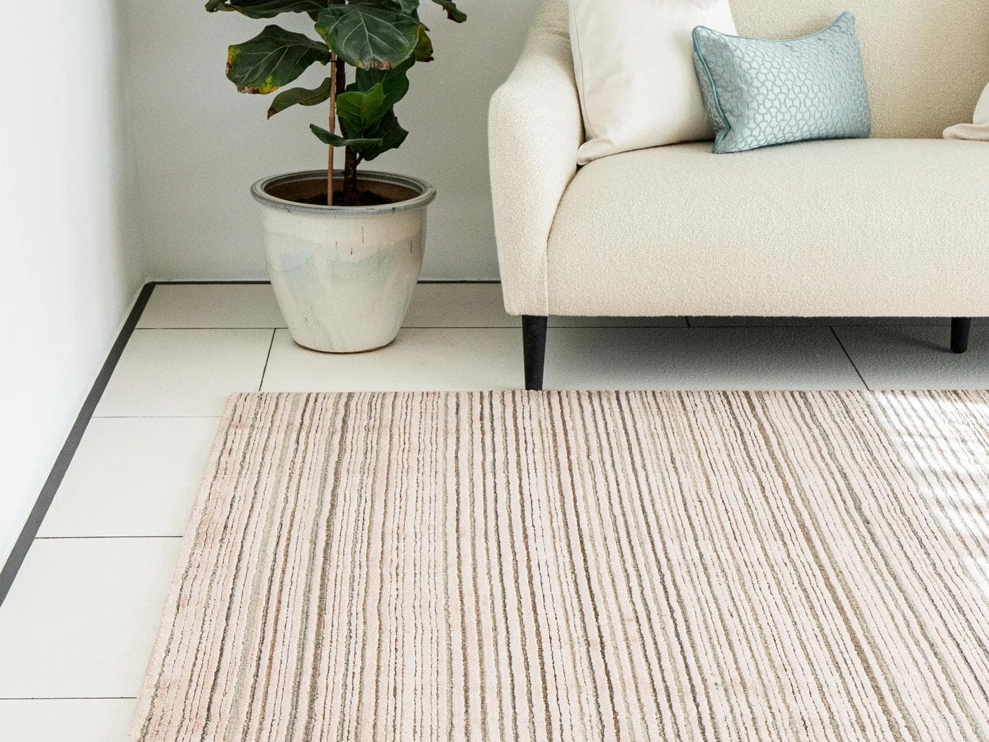 Rita Rosso carpets in pink, shown in a lifestyle front view as image 1