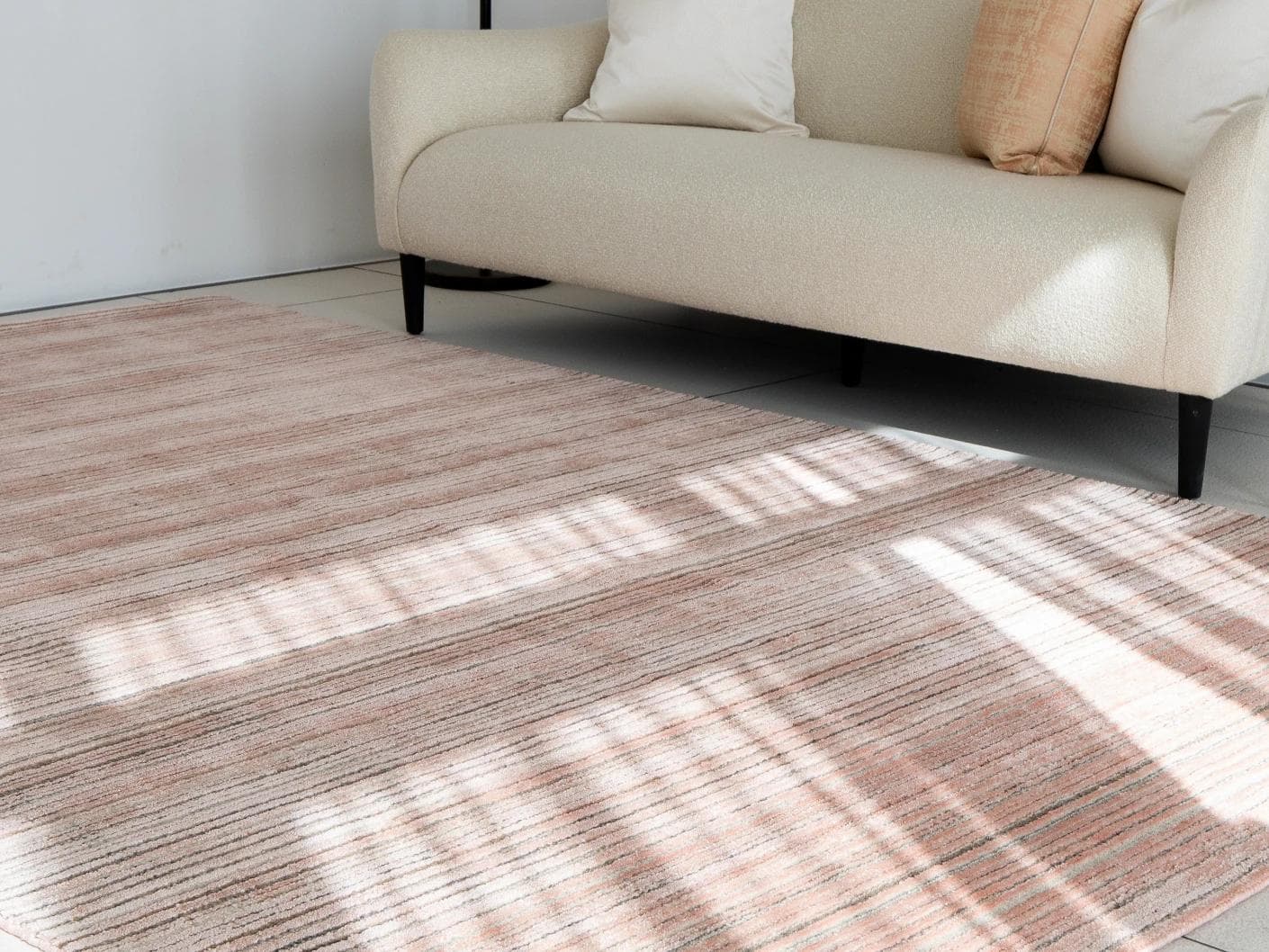 Rita Rosso carpets in pink, shown in a lifestyle right view as image 2