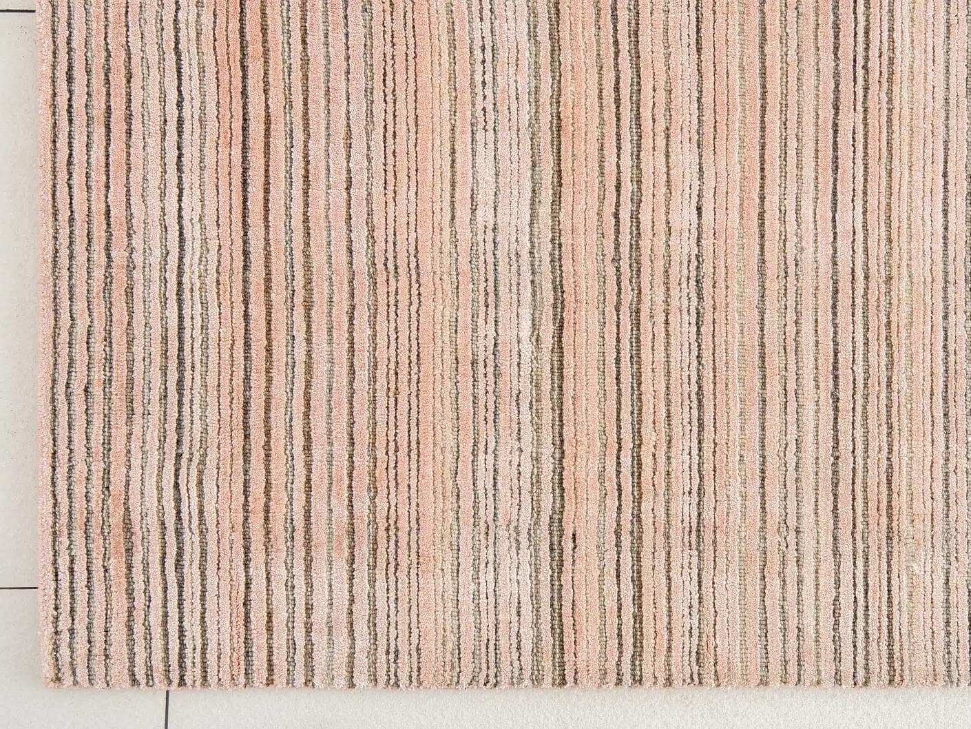 Rita Rosso carpets in pink, shown in a lifestyle top view as image 3