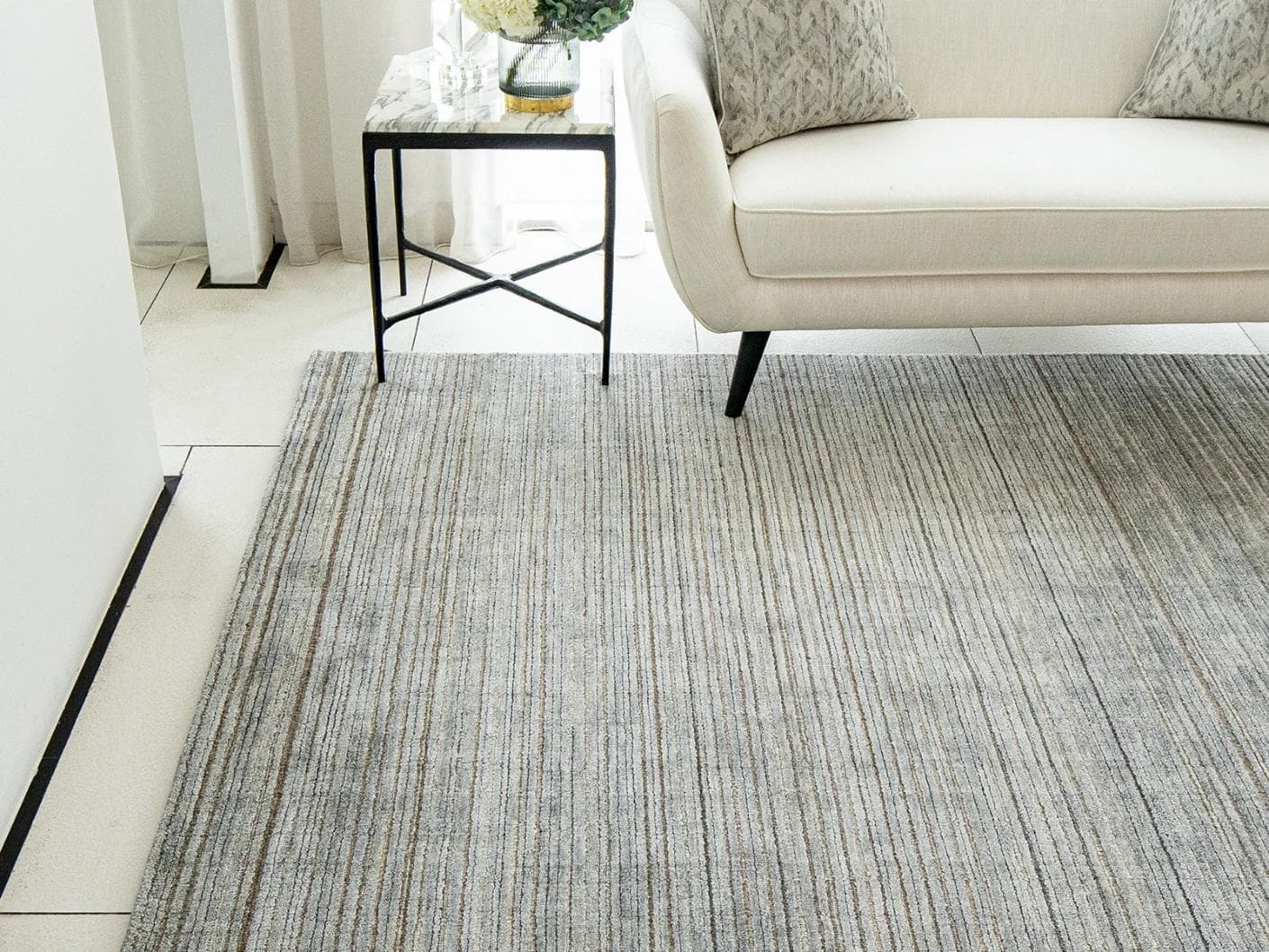 Rita Stevens carpet in grey, shown in a lifestyle front view as image 4