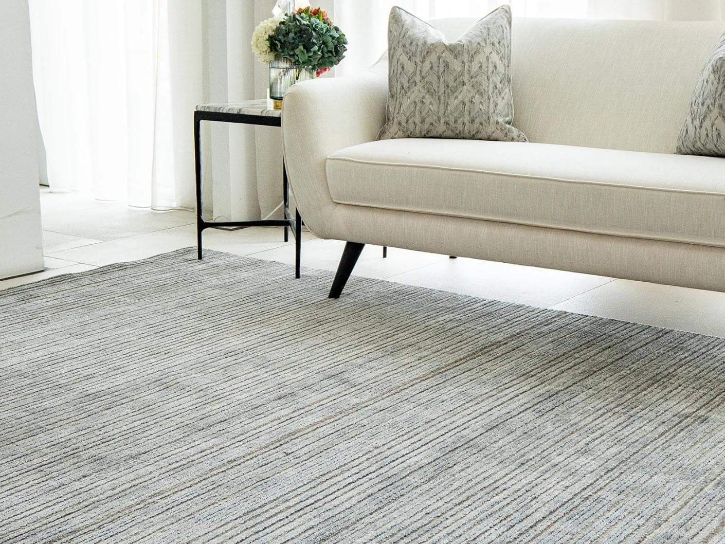 Rita Stevens carpet in grey, shown in a lifestyle right view as image 5