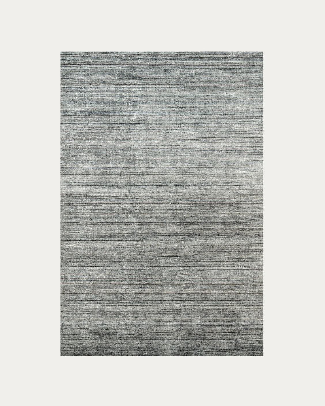 Rita Stevens carpets in grey, shown in a product top view as image 1