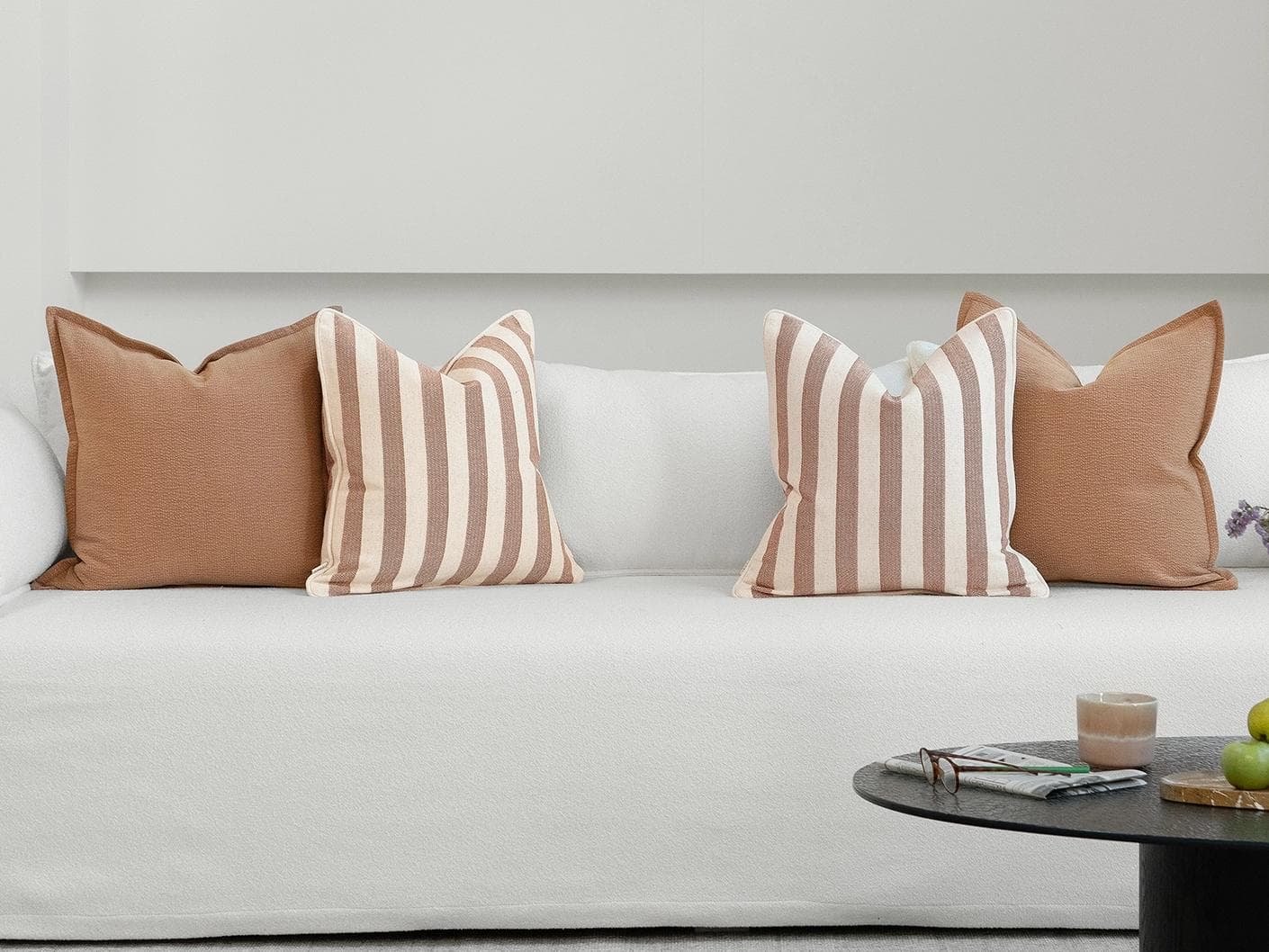Riza Bundle cushion, shown in a lifestyle front view as image 4