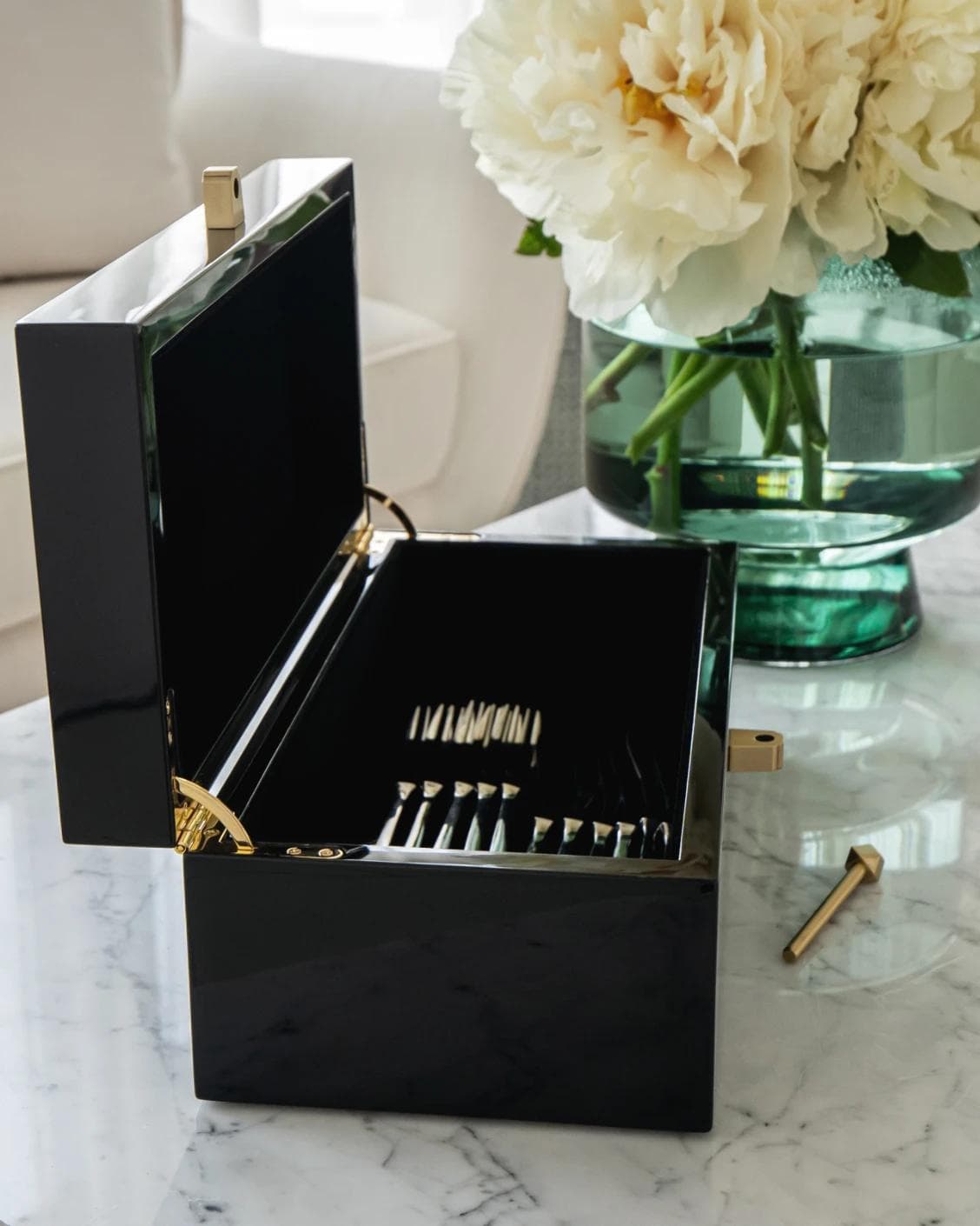 Romare Cornell accessory in black, shown in a lifestyle left view as image 4
