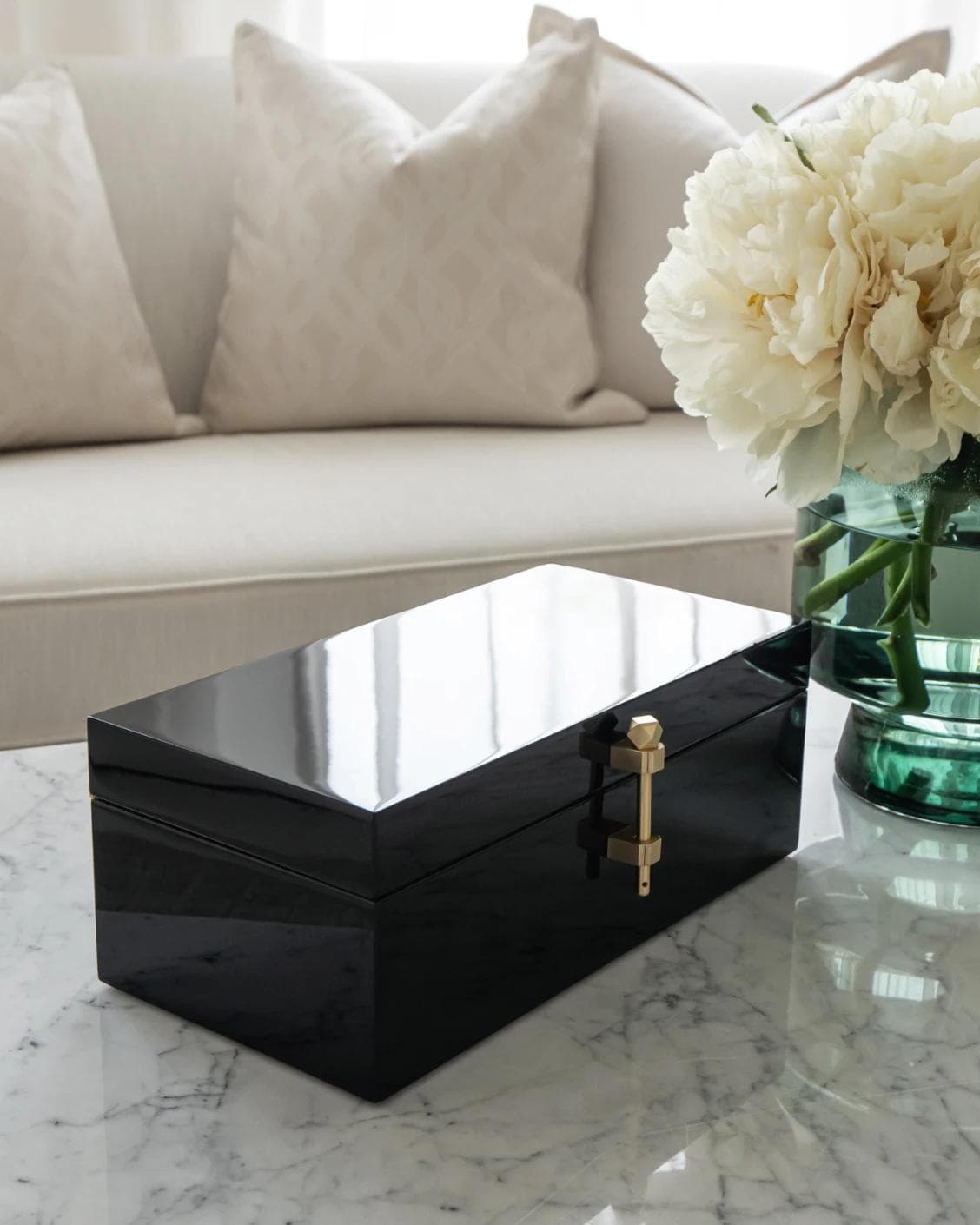 Romare Cornell accessory in black, shown in a lifestyle left view as image 2