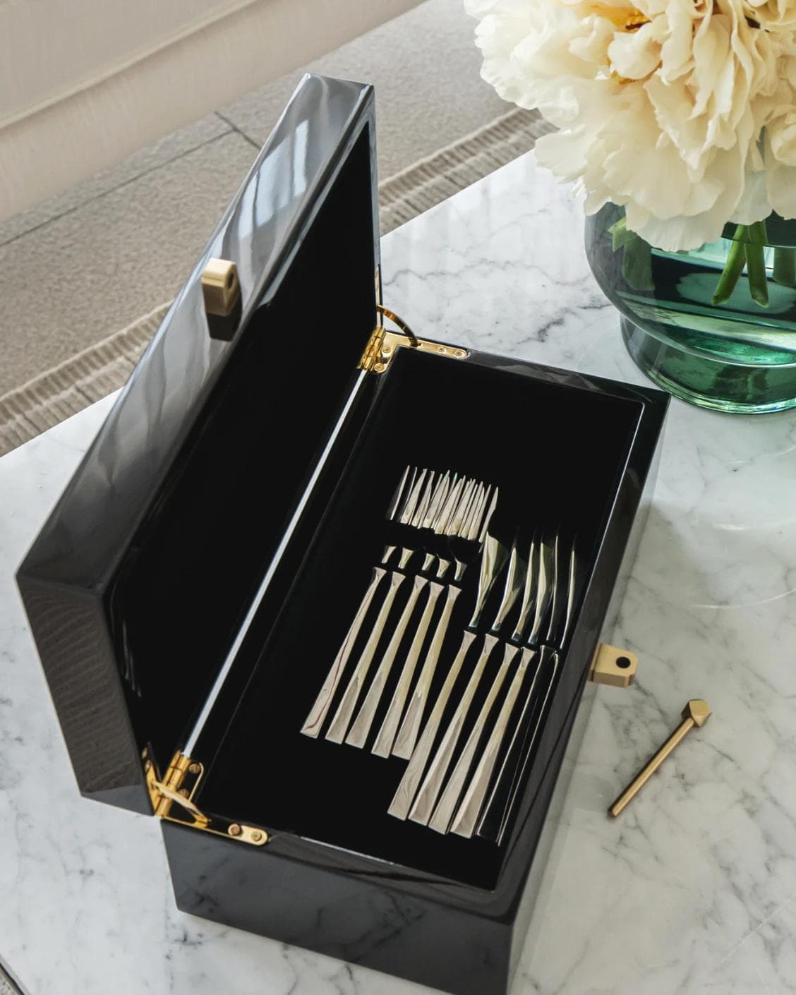 Romare Cornell accessory in black, shown in a lifestyle top view as image 6