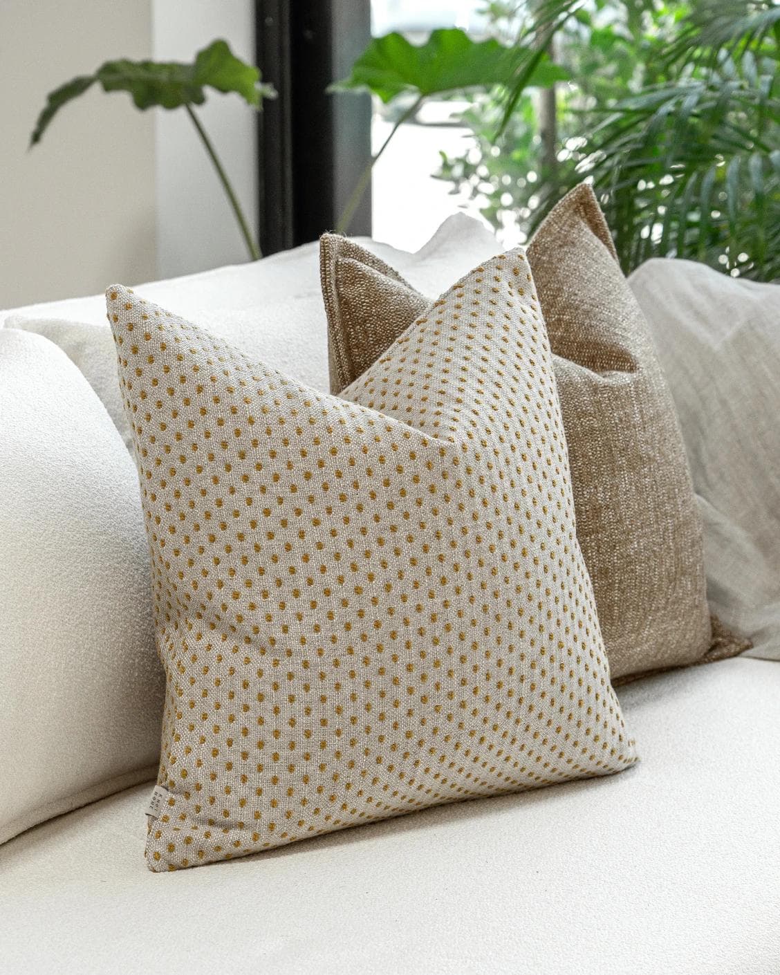 Romi Bundle cushion in brown and beige, shown in a product left view as image 7