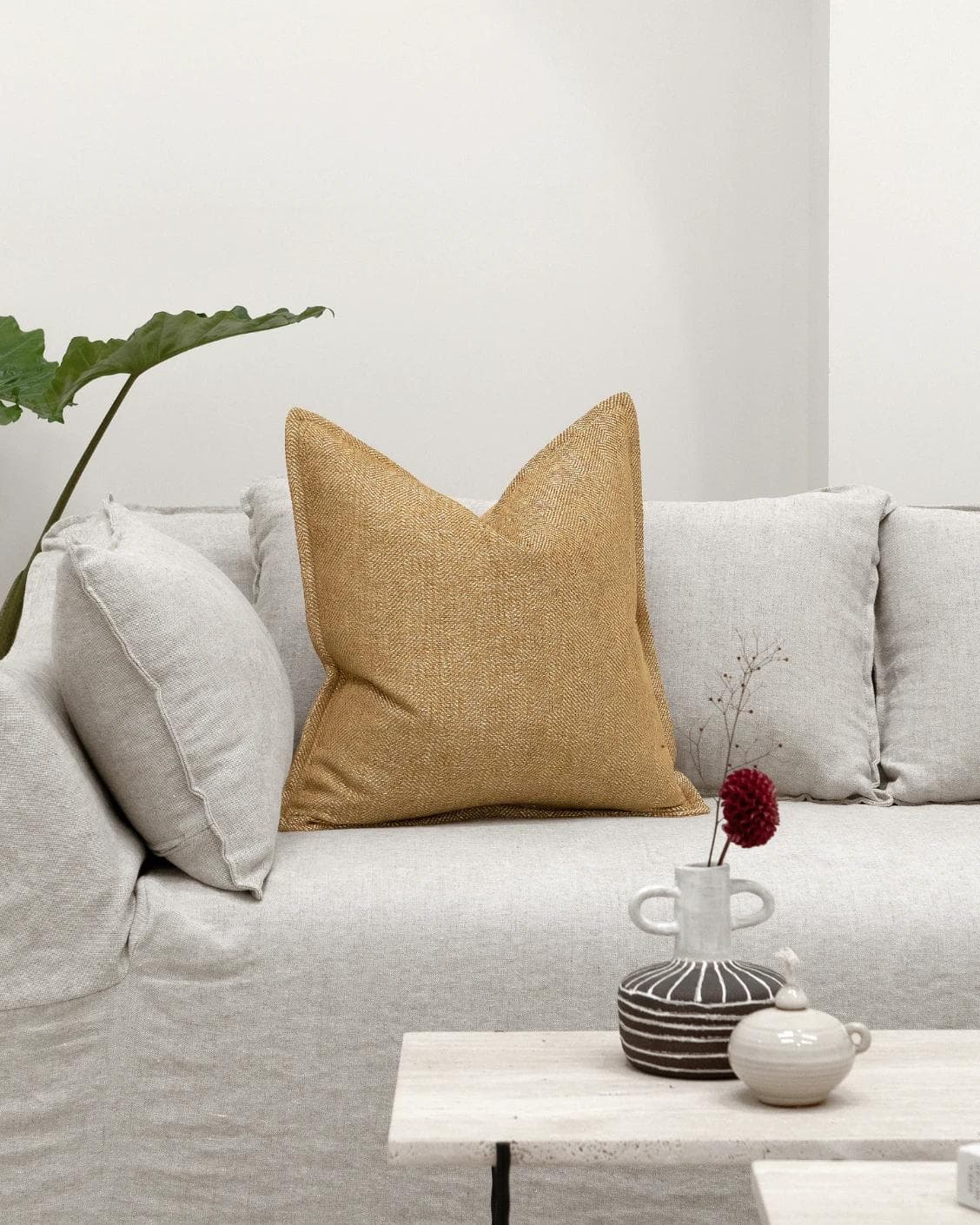 Rue Gaze cushion in beige, shown in a lifestyle front view as image 4