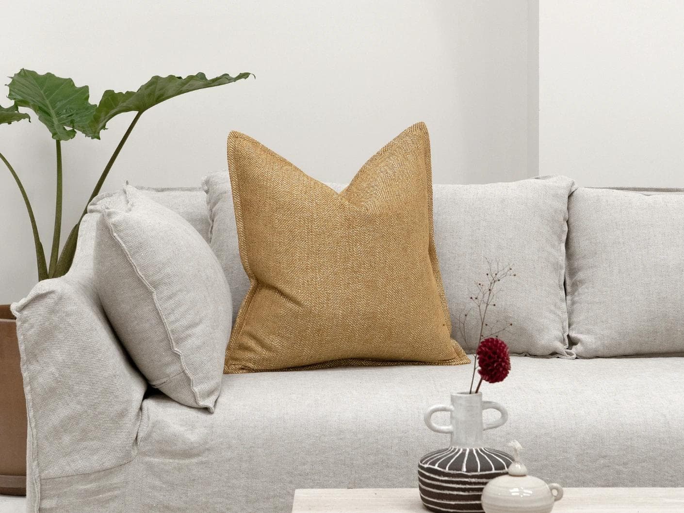 Rue Gaze cushion in beige, shown in a lifestyle front view as image 4
