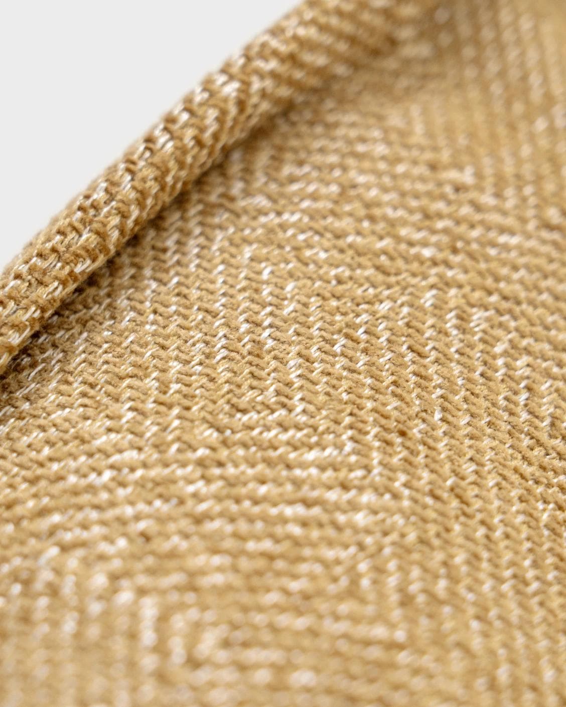Rue Gaze cushion in beige, shown in a product close-up as image 8