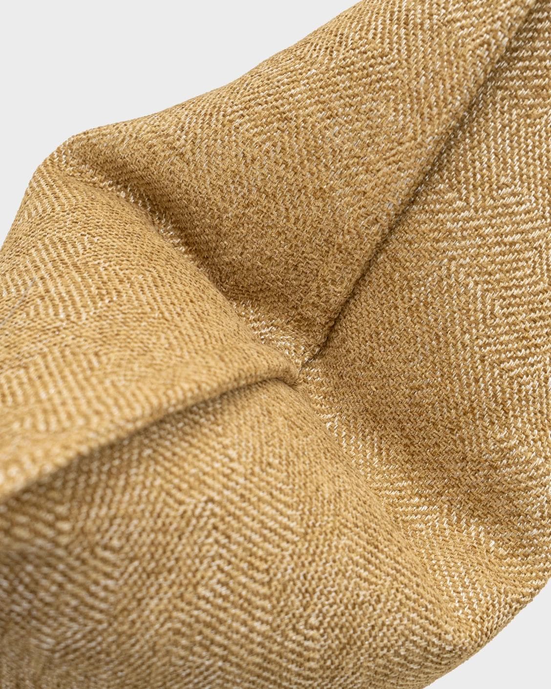 Rue Gaze cushion in beige, shown in a product top view as image 10