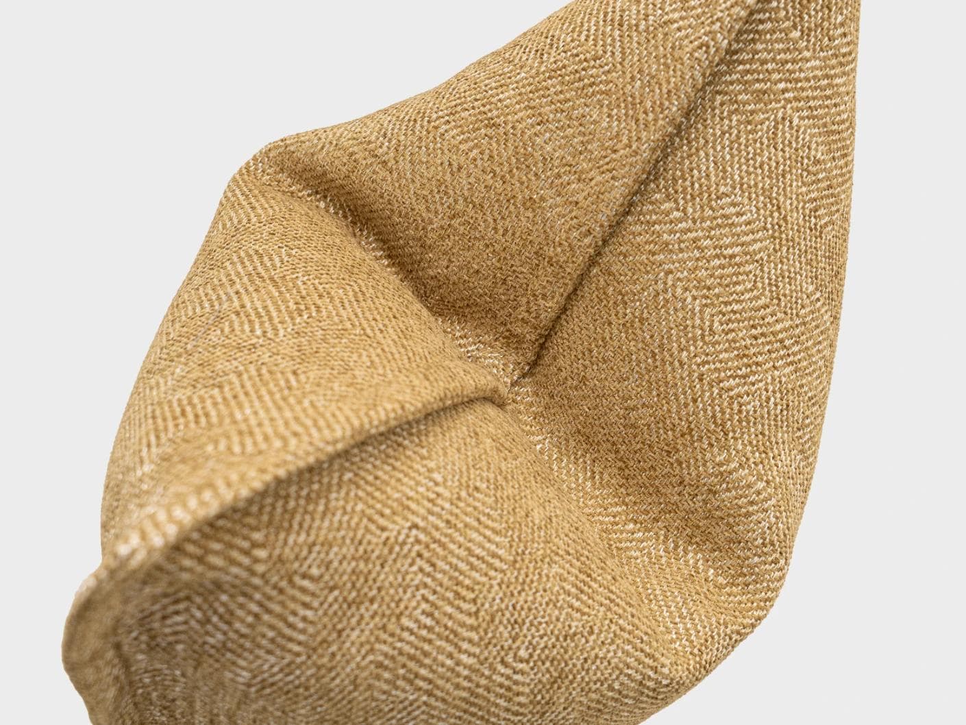 Rue Gaze cushion in beige, shown in a product top view as image 10