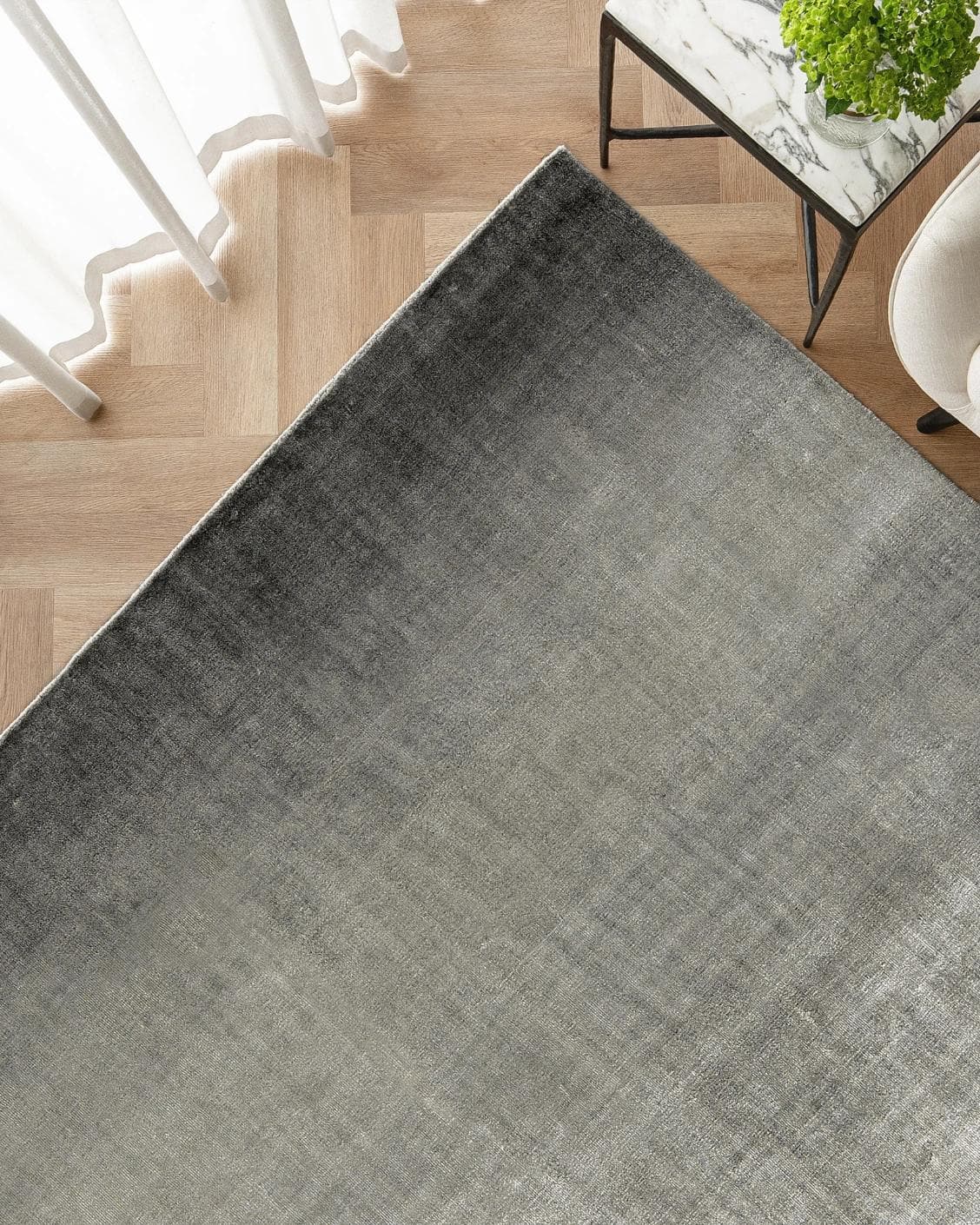 Scarlette Ashton carpet in grey, shown in a lifestyle top view as image 2