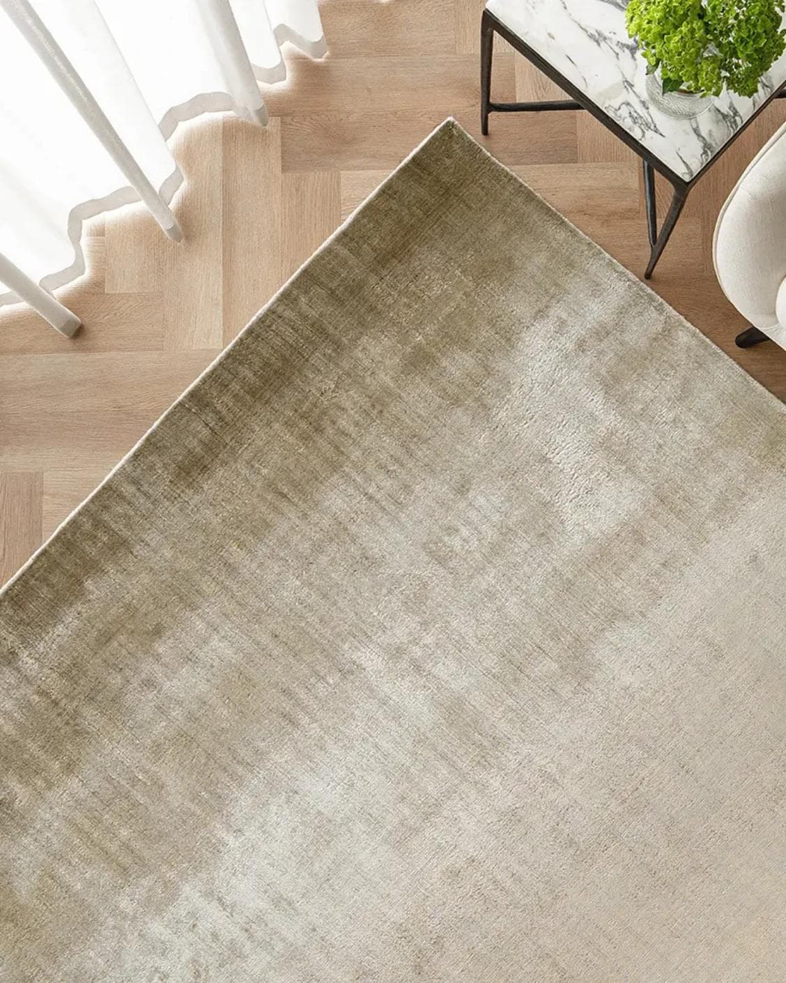 Scarlette Sandy carpet in beige and gold, shown in a lifestyle top view as image 2
