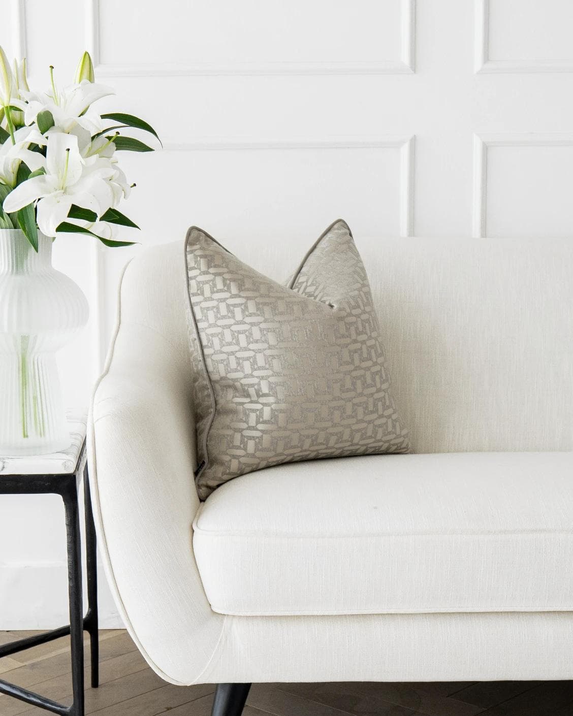 Selena Laurent cushion in white and silver, shown in a lifestyle front view as image 4
