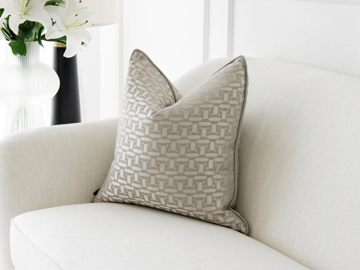 Selena Laurent cushion in white and silver, shown in a lifestyle front view as image 2