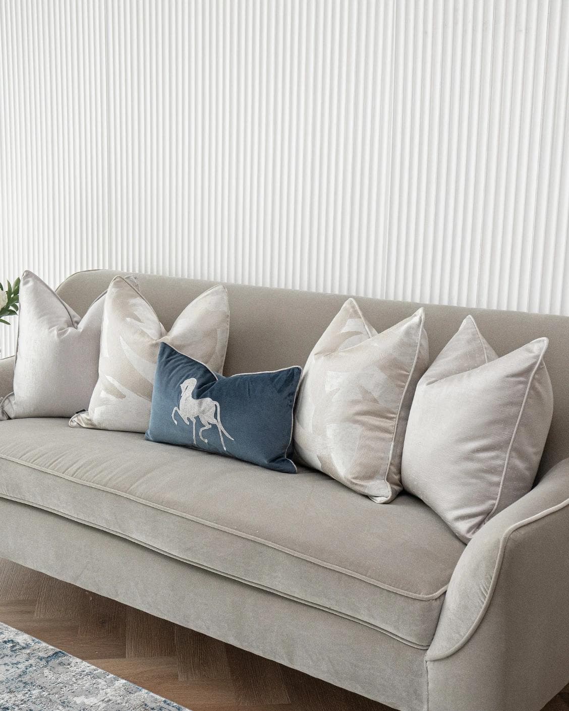Miguel Bundle cushion in silver, beige and blue, shown in a lifestyle right view as image 4