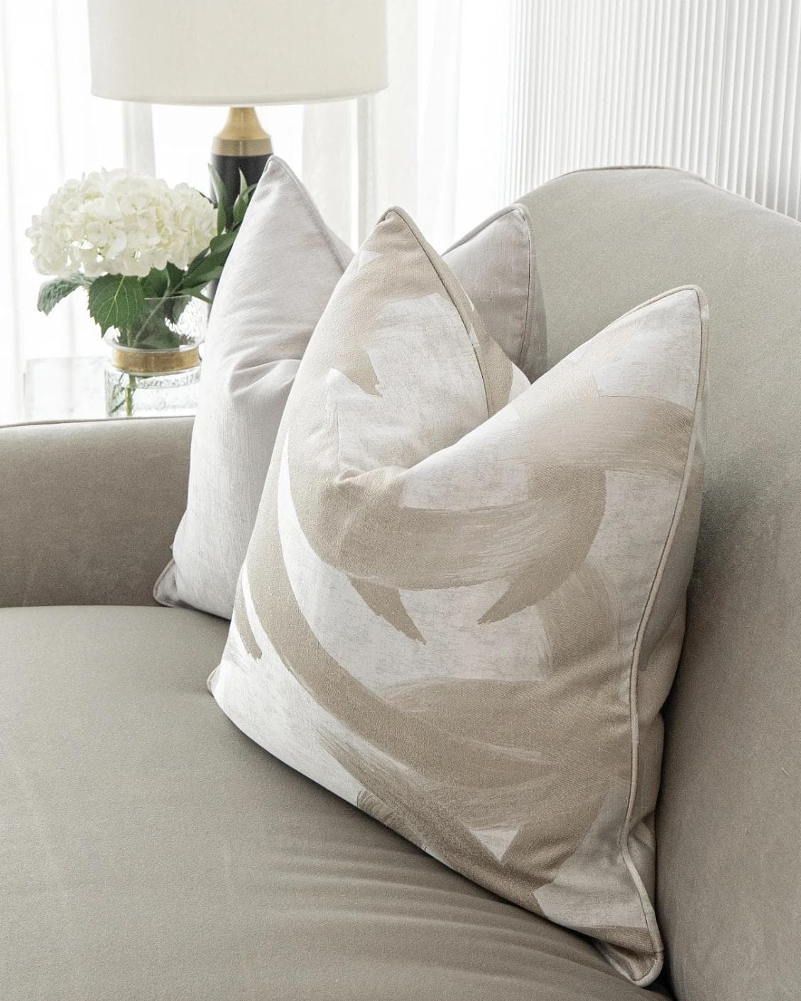 Miguel Bundle cushion in silver, beige and blue, shown in a lifestyle right view as image 5
