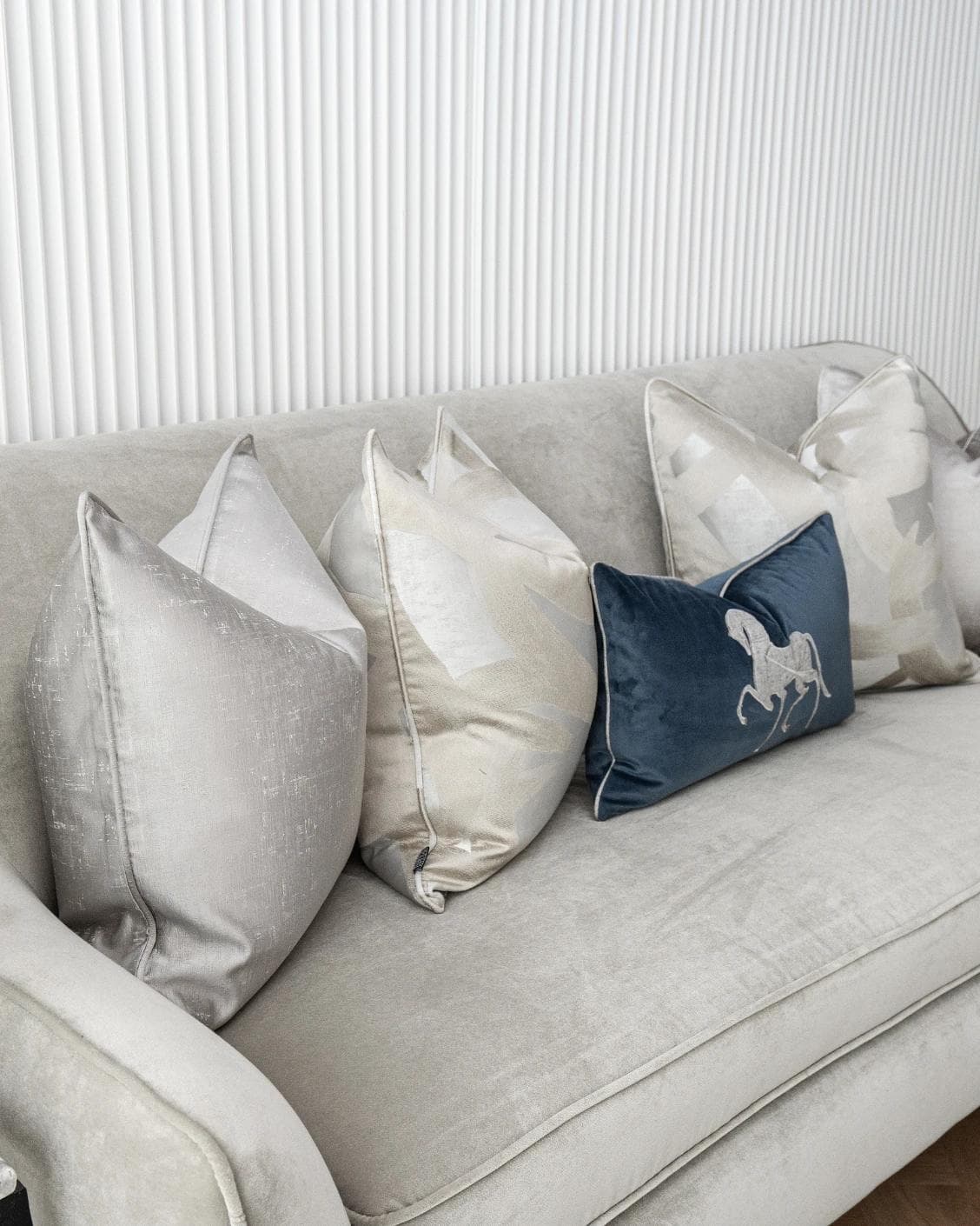 Miguel Bundle cushion in silver, beige and blue, shown in a product left view as image 6