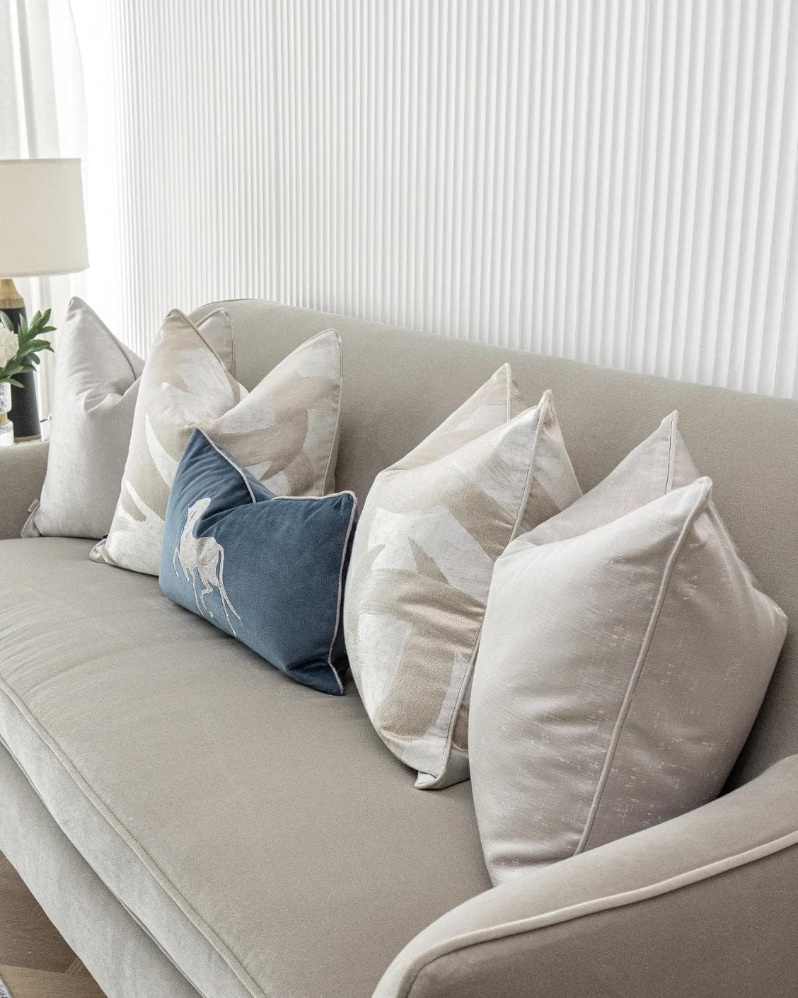 Miguel Bundle cushion in silver, beige and blue, shown in a product right view as image 8