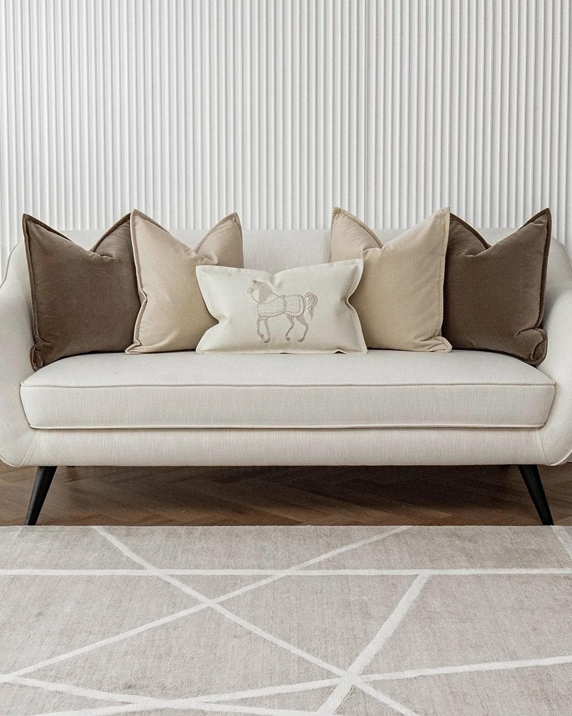 Nadine Bundle cushion in beige, brown and white, shown in a lifestyle front view as image 4