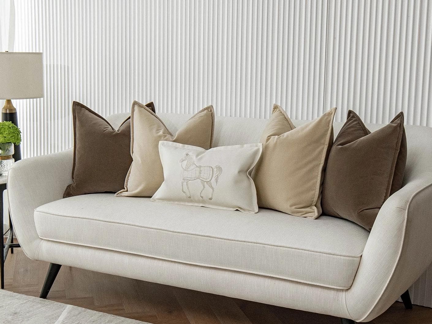 Nadine Bundle cushion in beige, brown and white, shown in a lifestyle right view as image 2