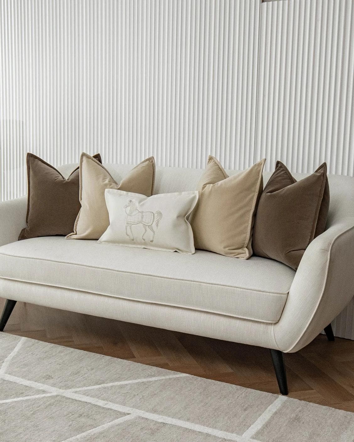Nadine Bundle cushion in beige, brown and white, shown in a lifestyle right view as image 2