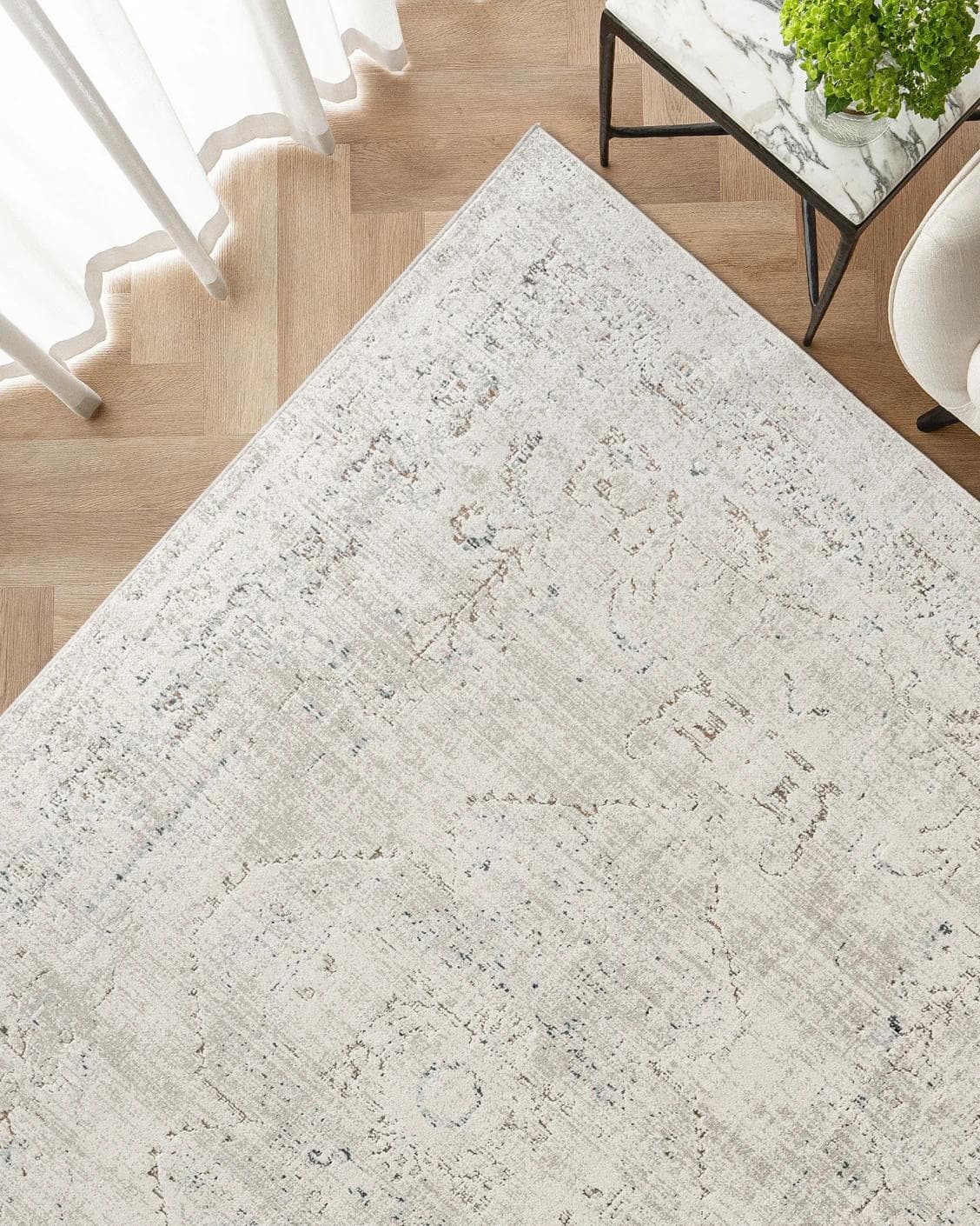 Sheldon Bianca carpet in beige, shown in a lifestyle top view as image 2