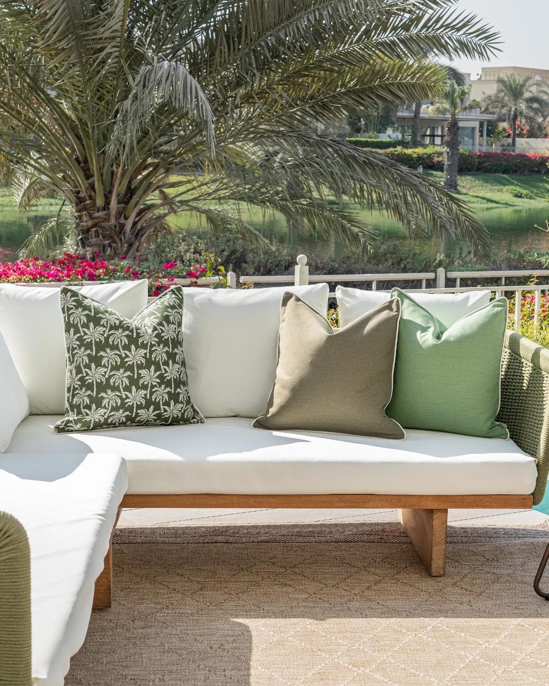 Shikha Bundle cushion in green, shown in a lifestyle front view as image 4