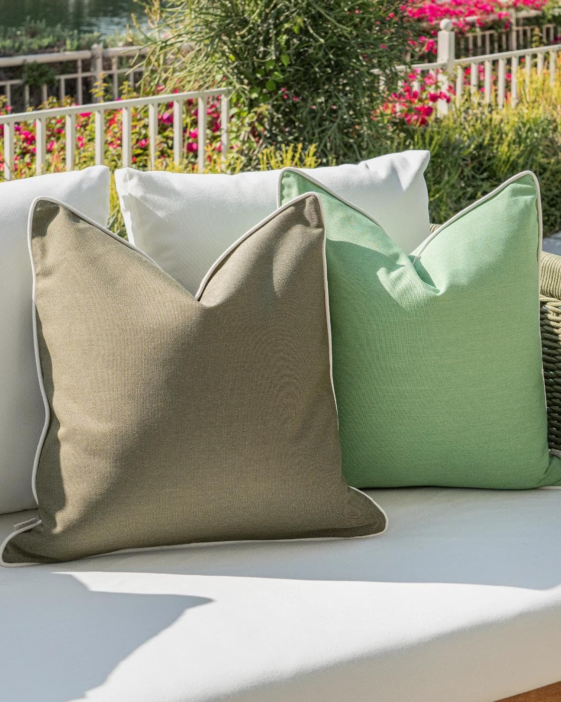 Shikha Bundle cushion in green, shown in a lifestyle left view as image 5