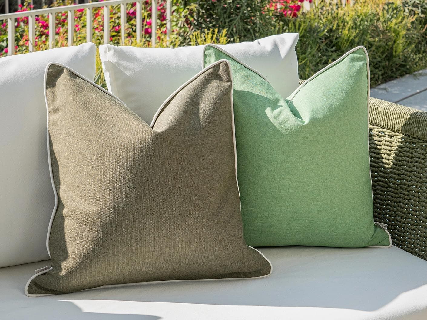 Shikha Bundle cushion in green, shown in a lifestyle left view as image 5