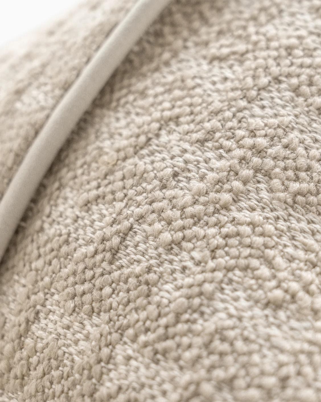 Sia Laurent cushion in ivory, shown in a product close-up as image 7