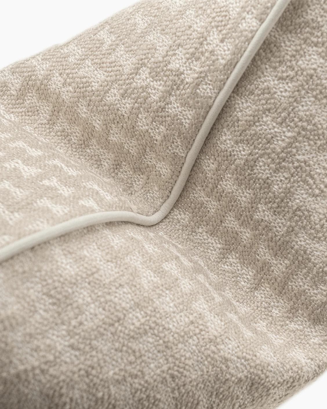 Sia Laurent cushion in ivory, shown in a product top view as image 9