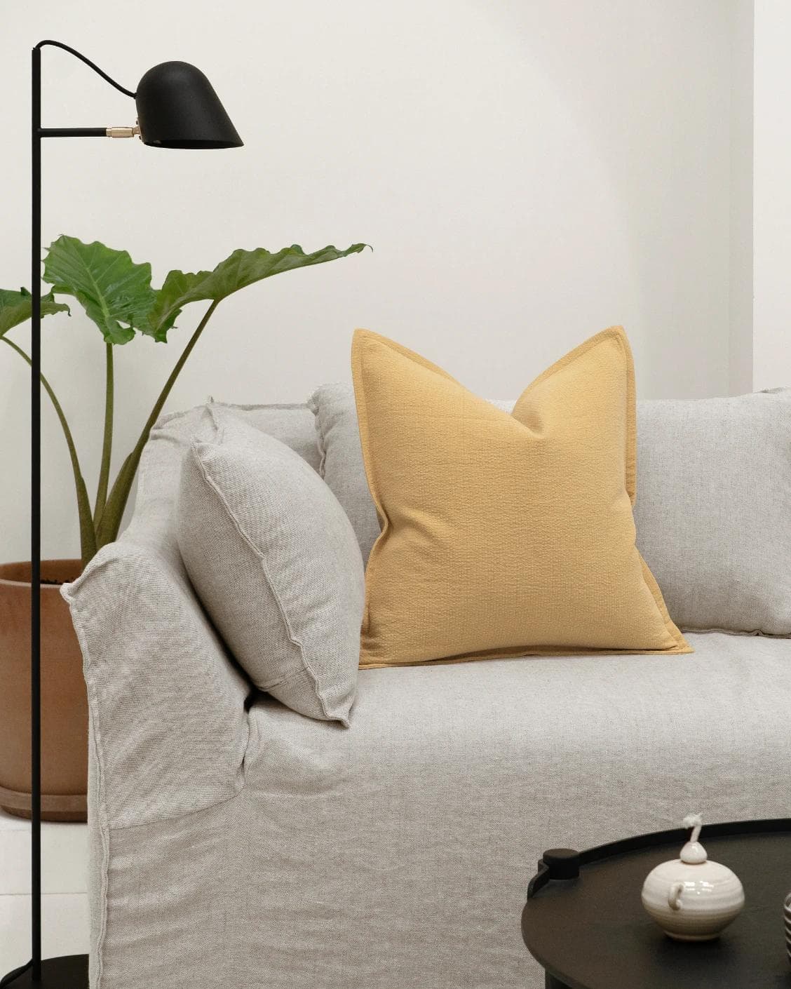 Siena Barrymore cushion in yellow, shown in a lifestyle front view as image 4