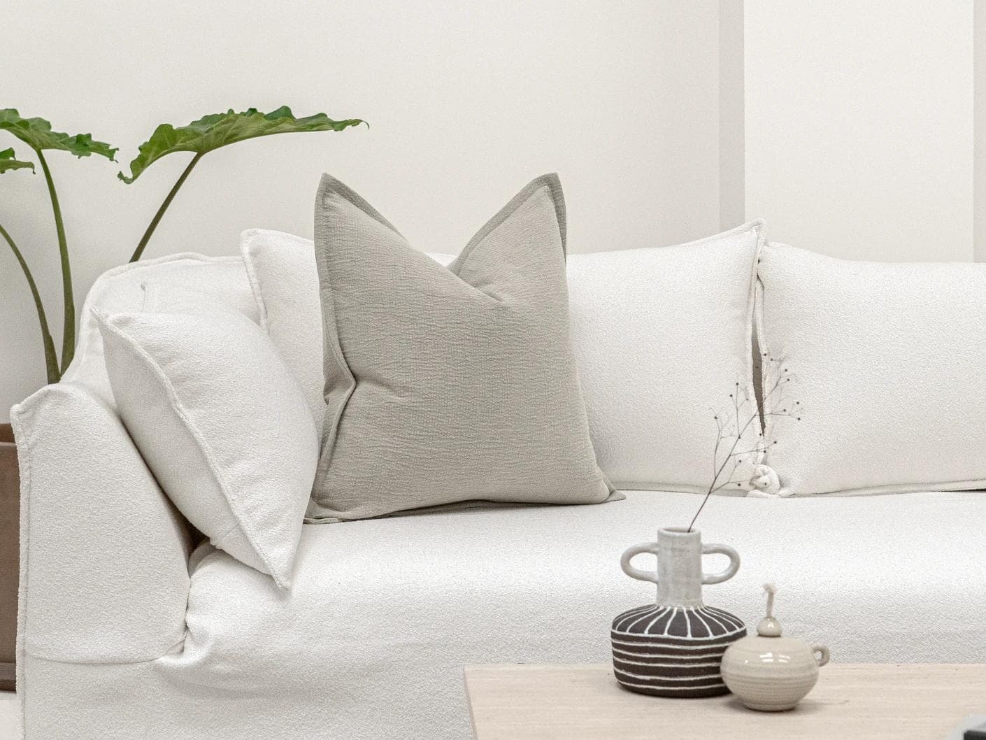 Siena Klimt cushion in grey, shown in a lifestyle front view as image 4