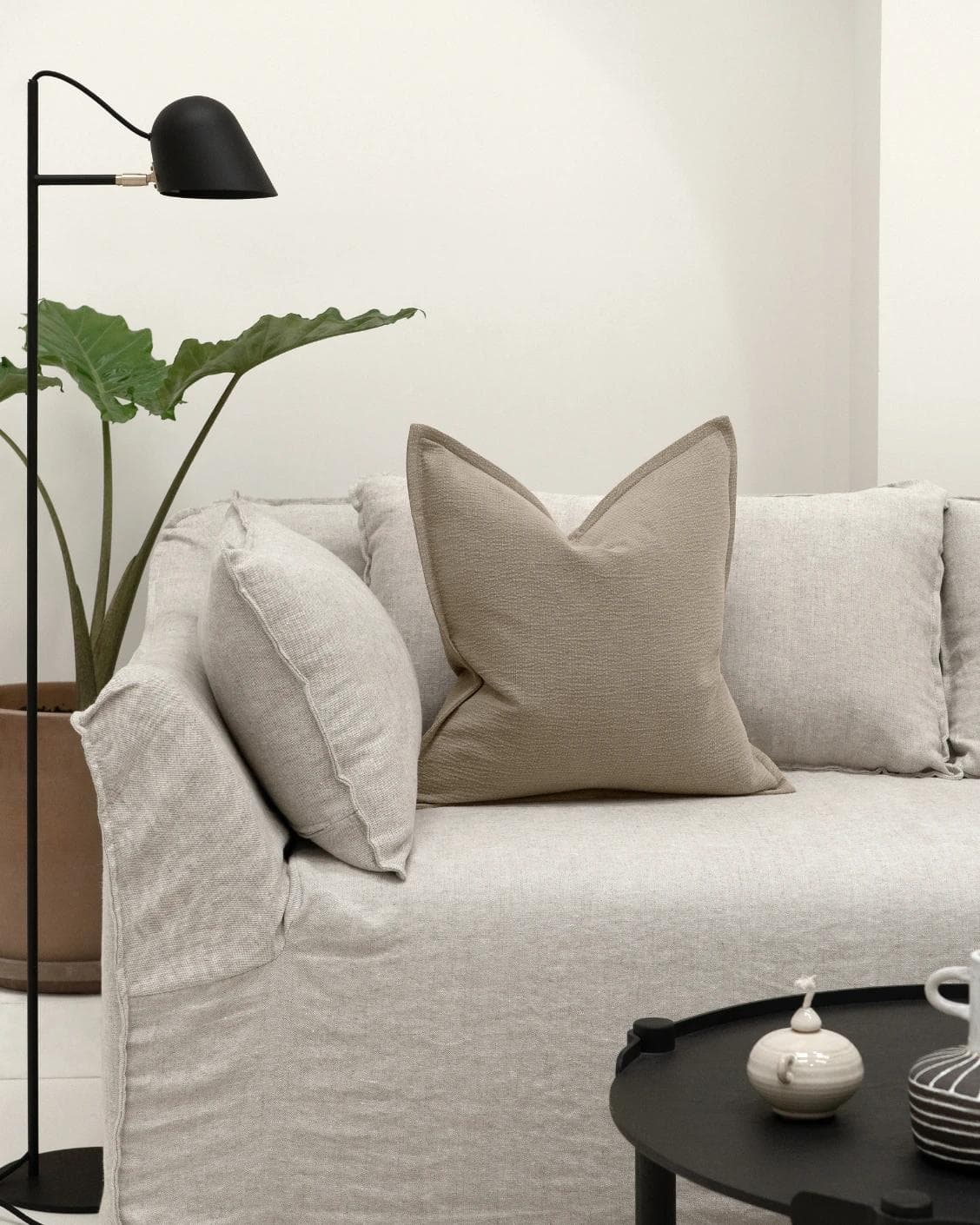 Siena River cushion in grey, shown in a lifestyle front view as image 4