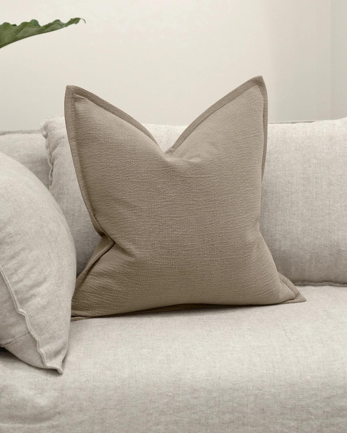 Siena River cushion in grey, shown in a lifestyle front view as image 2