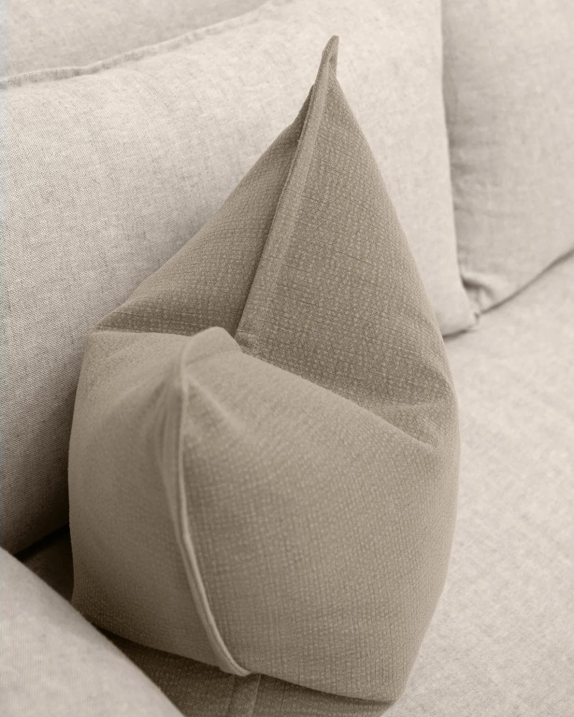 Siena River cushion in grey, shown in a lifestyle top view as image 5