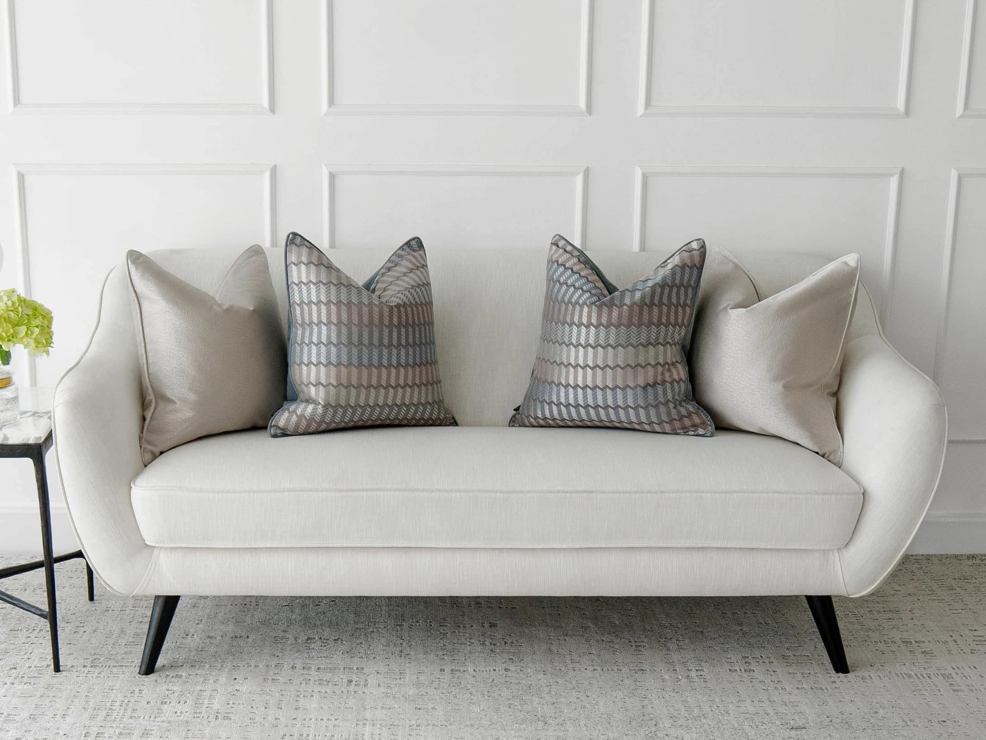 Gina Bundle cushion in silver and blue, shown in a lifestyle front view as image 6