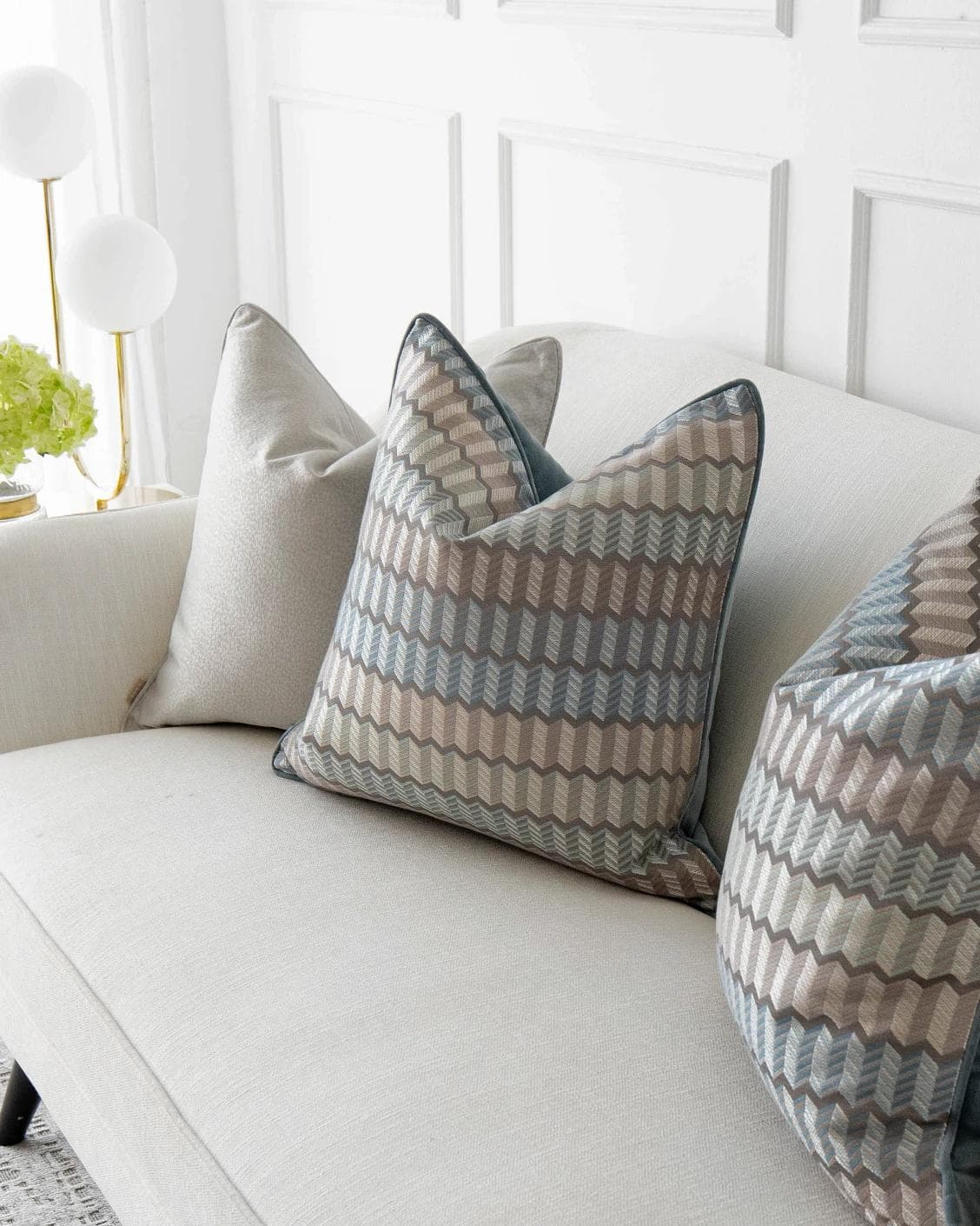 Gina Bundle cushion in silver and blue, shown in a lifestyle right view as image 7