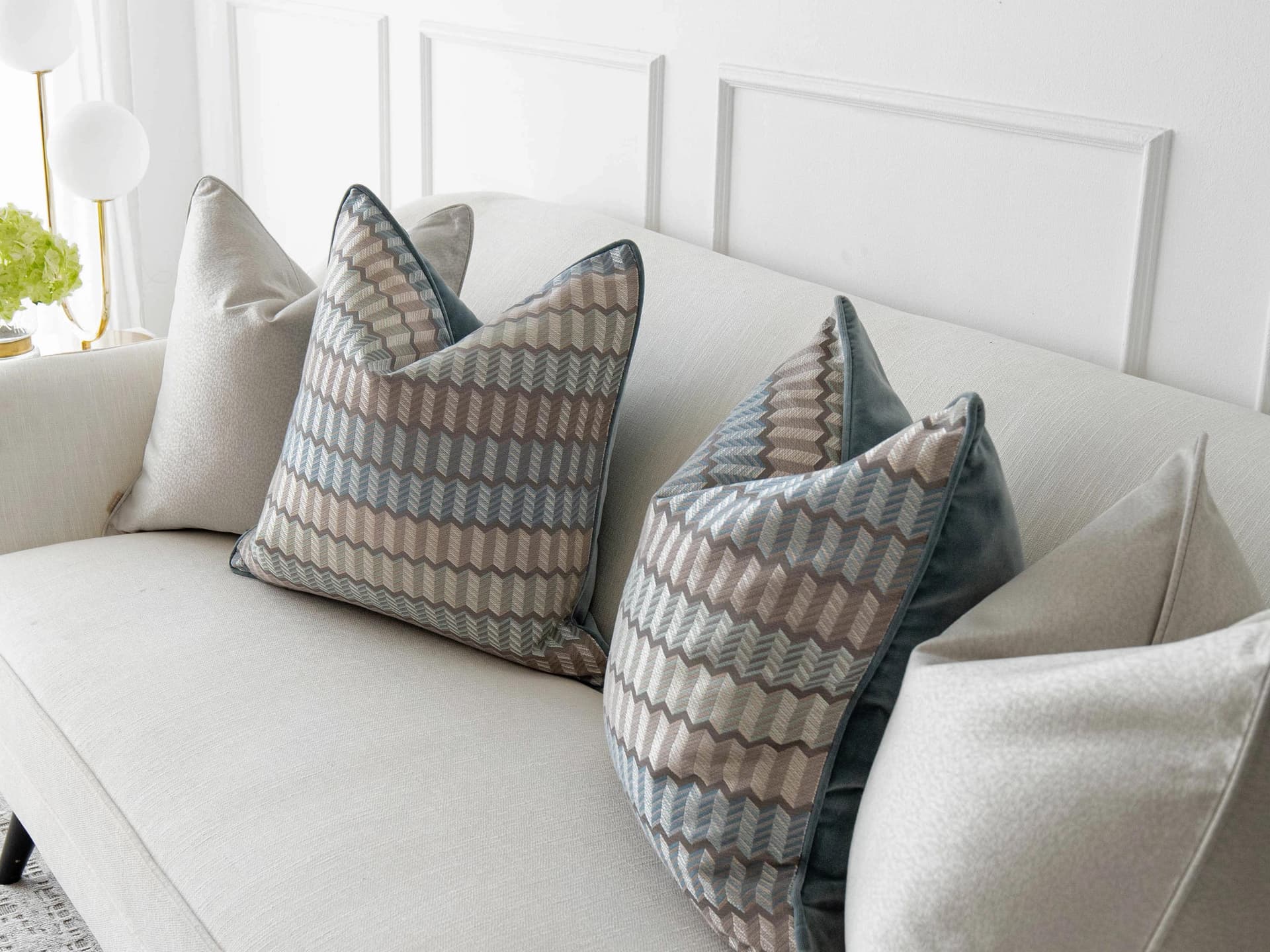Gina Bundle cushion in silver and blue, shown in a lifestyle right view as image 7