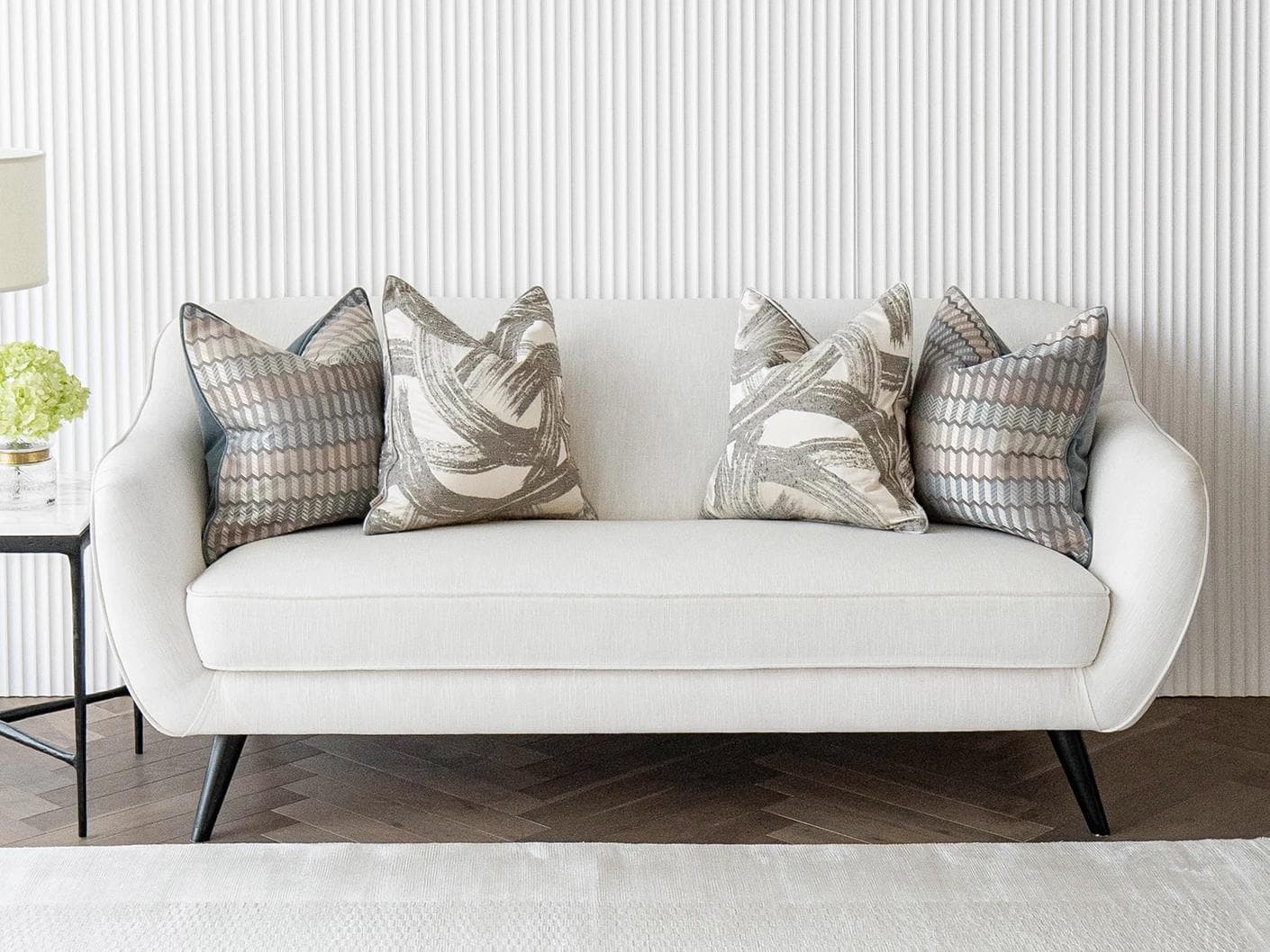 Meadow Bundle cushion in silver, blue, white and grey, shown in a lifestyle front view as image 4