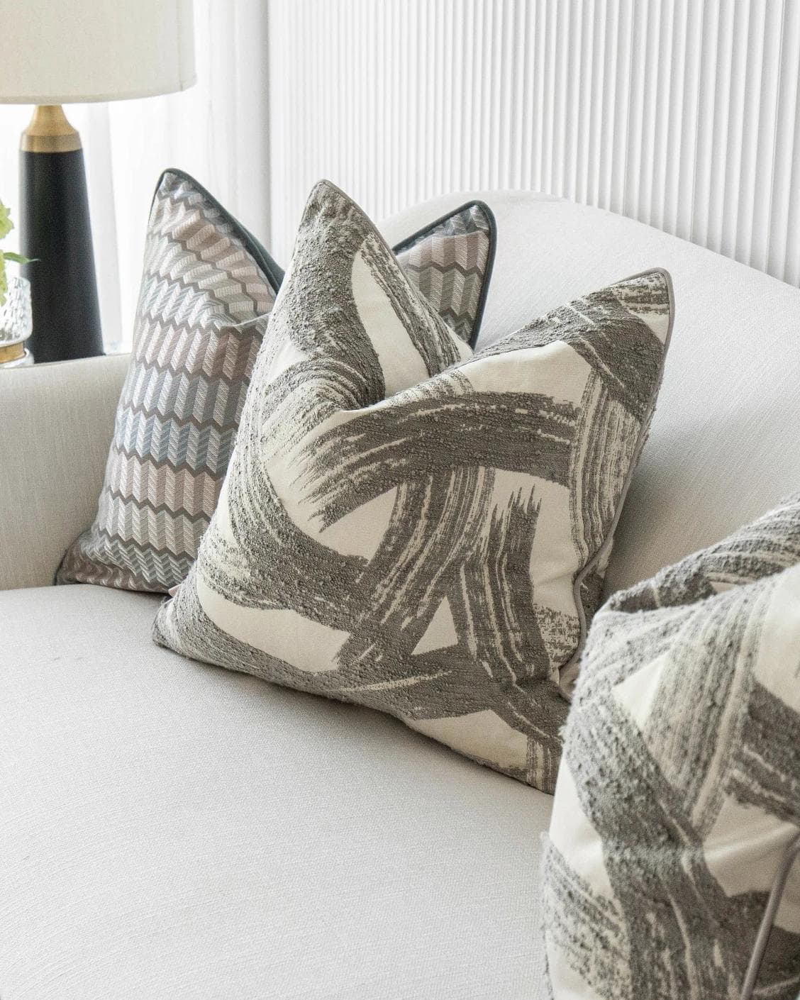 Meadow Bundle cushion in silver, blue, white and grey, shown in a product right view as image 5