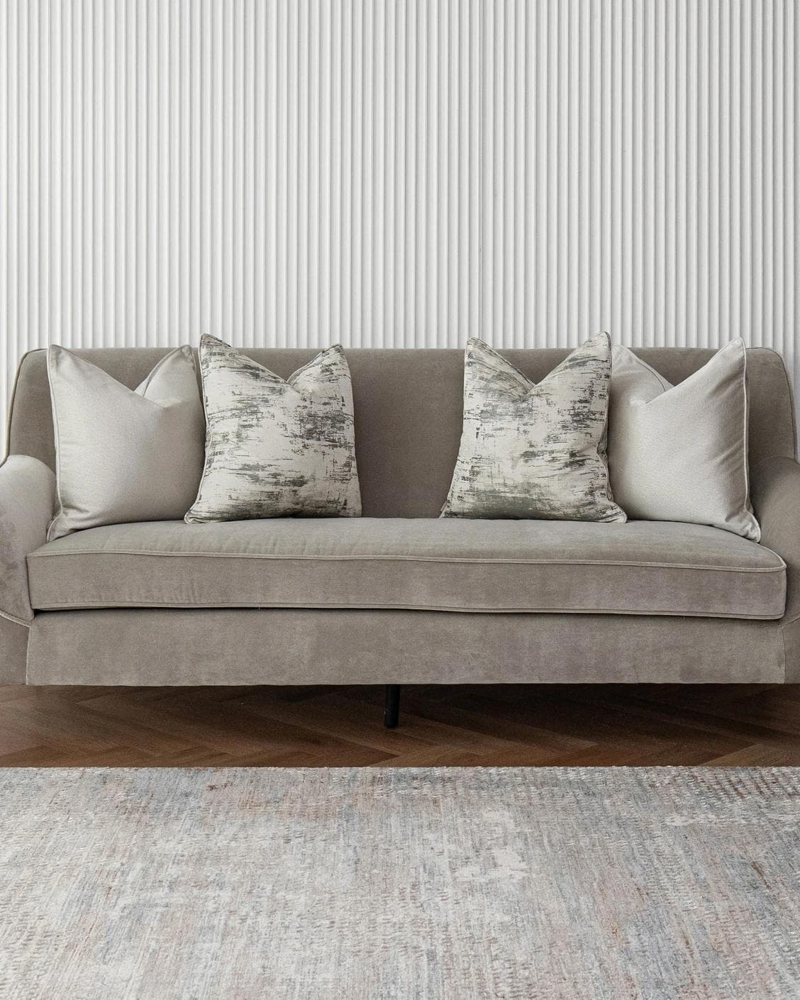 Ivanna Bundle cushion in silver, grey and white, shown in a lifestyle front view as image 4