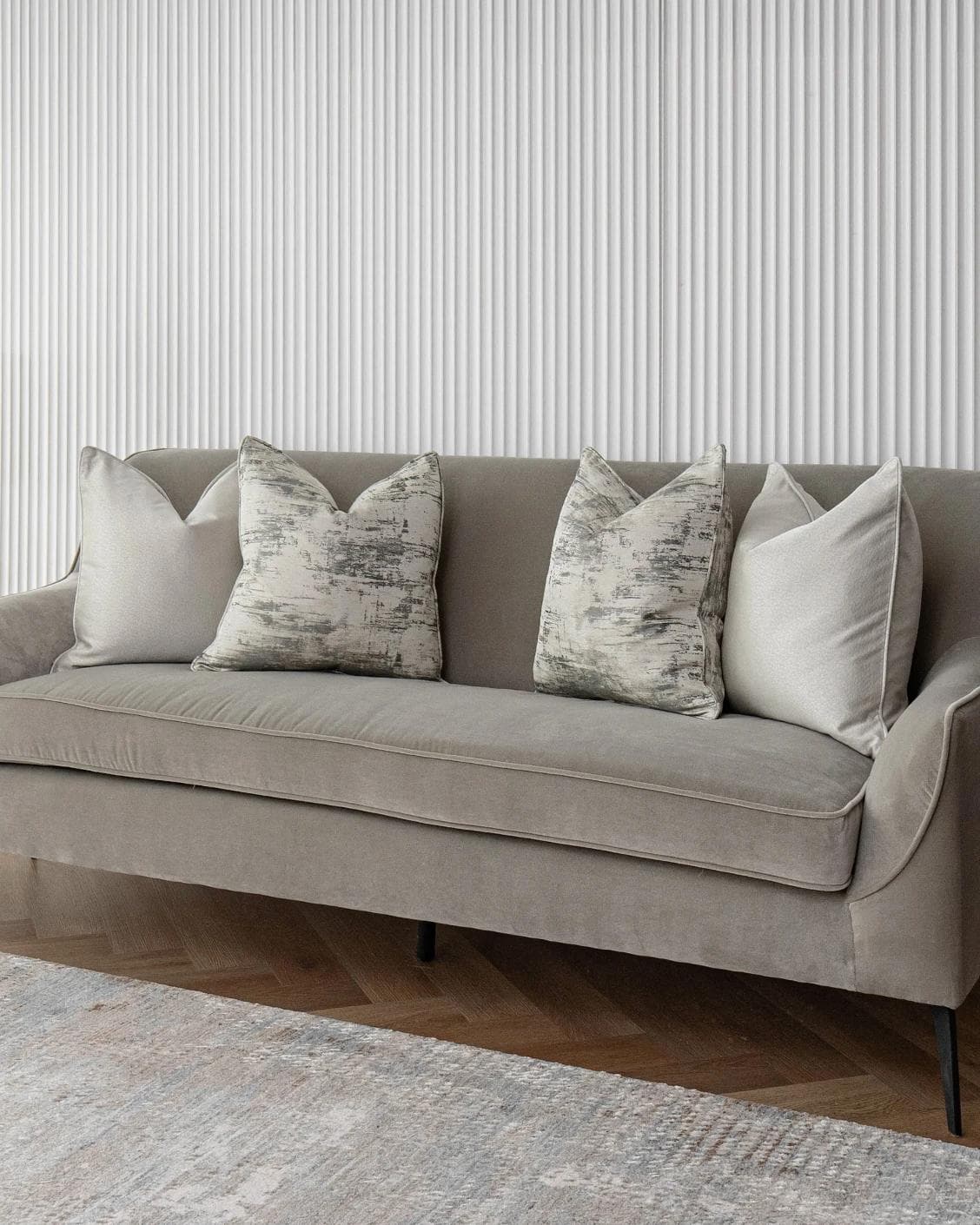Ivanna Bundle cushion in silver, grey and white, shown in a lifestyle right view as image 2