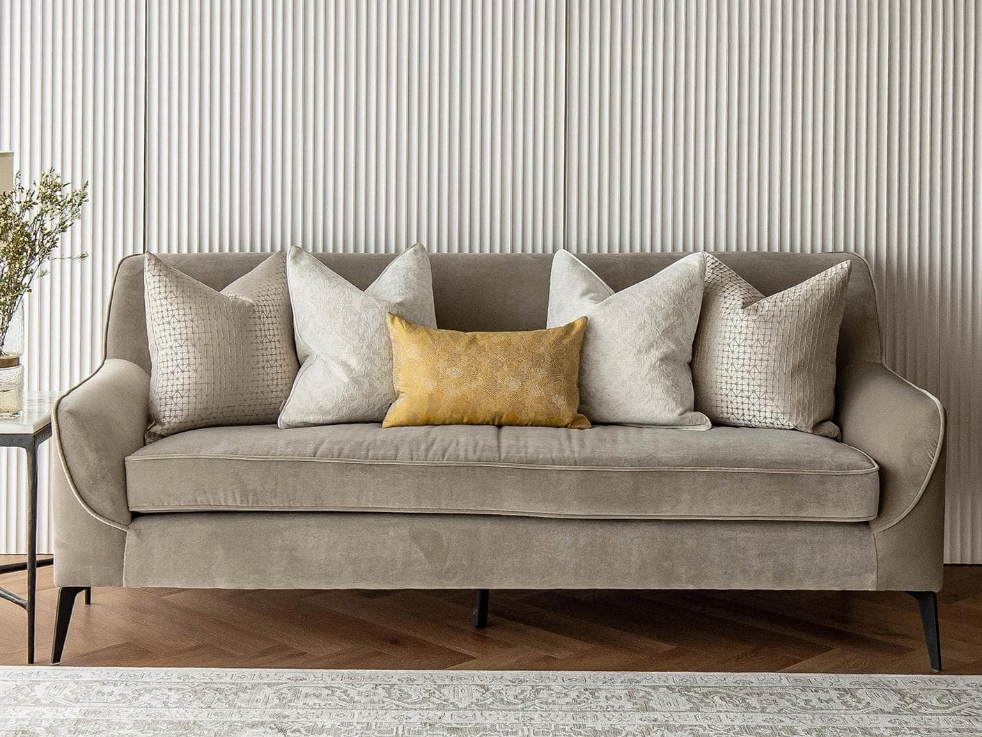 Ray Bundle cushion in silver, white and yellow, shown in a lifestyle front view as image 4