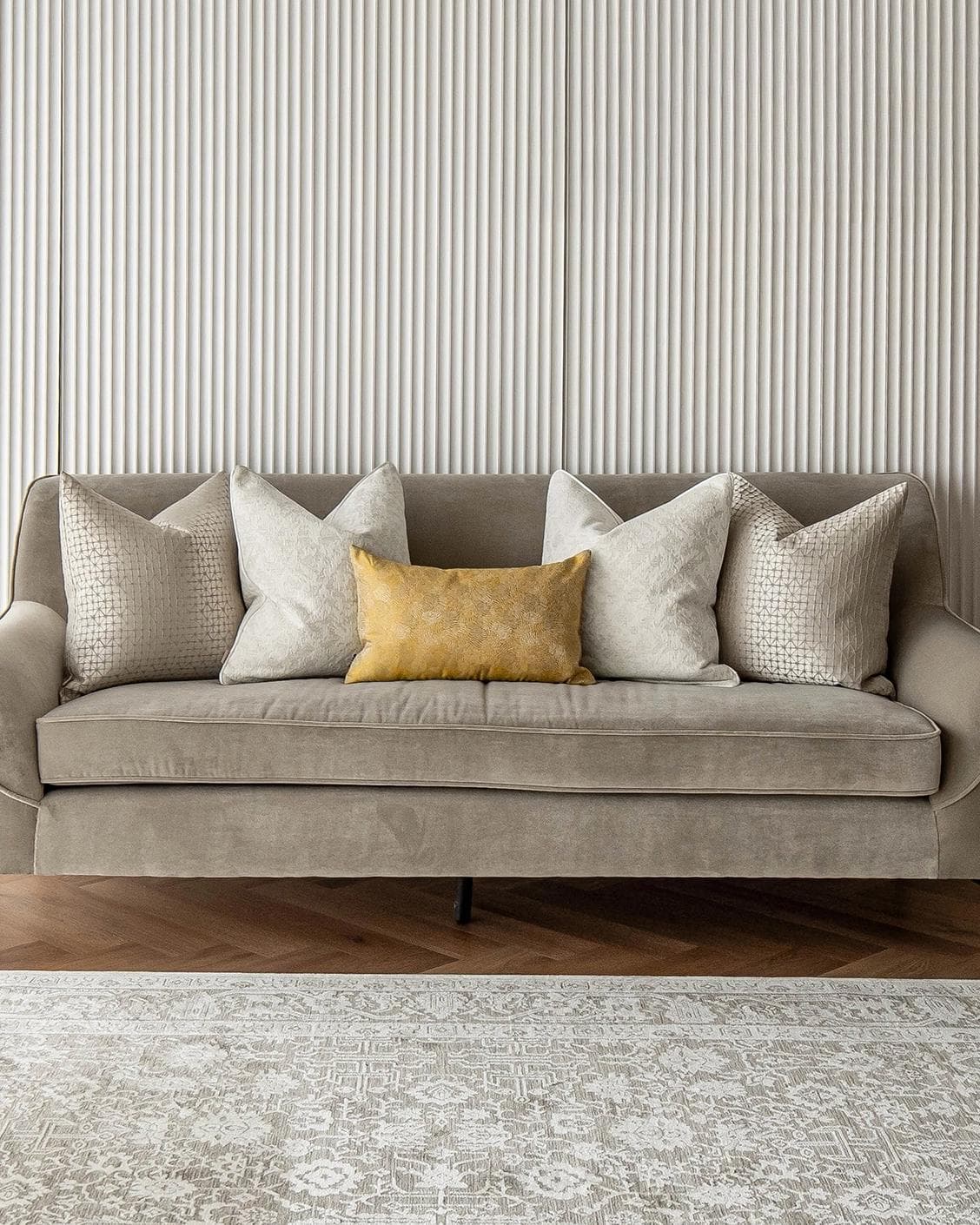 Ray Bundle cushion in silver, white and yellow, shown in a lifestyle front view as image 4