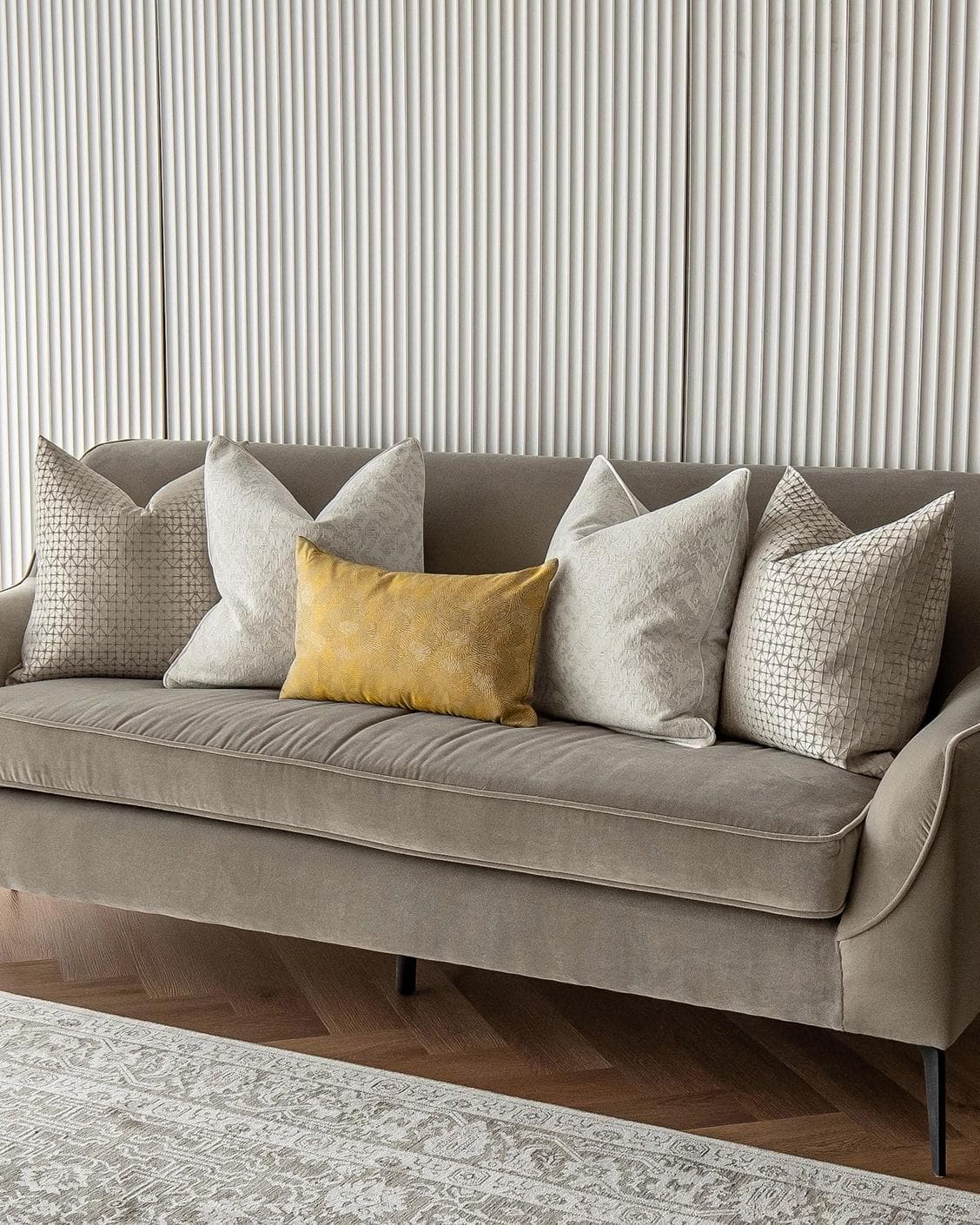 Ray Bundle cushion in silver, white and yellow, shown in a lifestyle right view as image 2