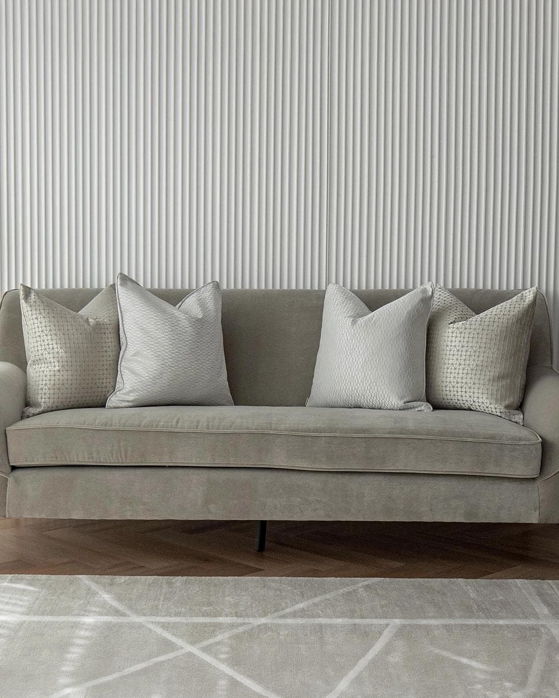 Isabelle Bundle cushion in silver and white, shown in a lifestyle front view as image 4