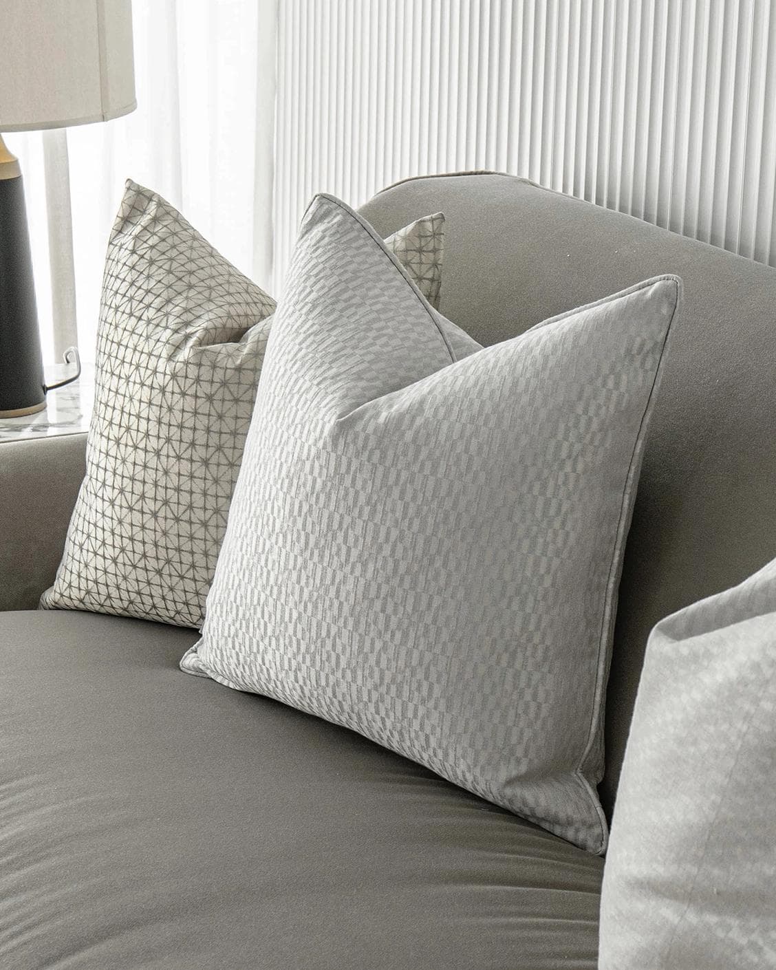 Isabelle Bundle cushion in silver and white, shown in a product right view as image 5